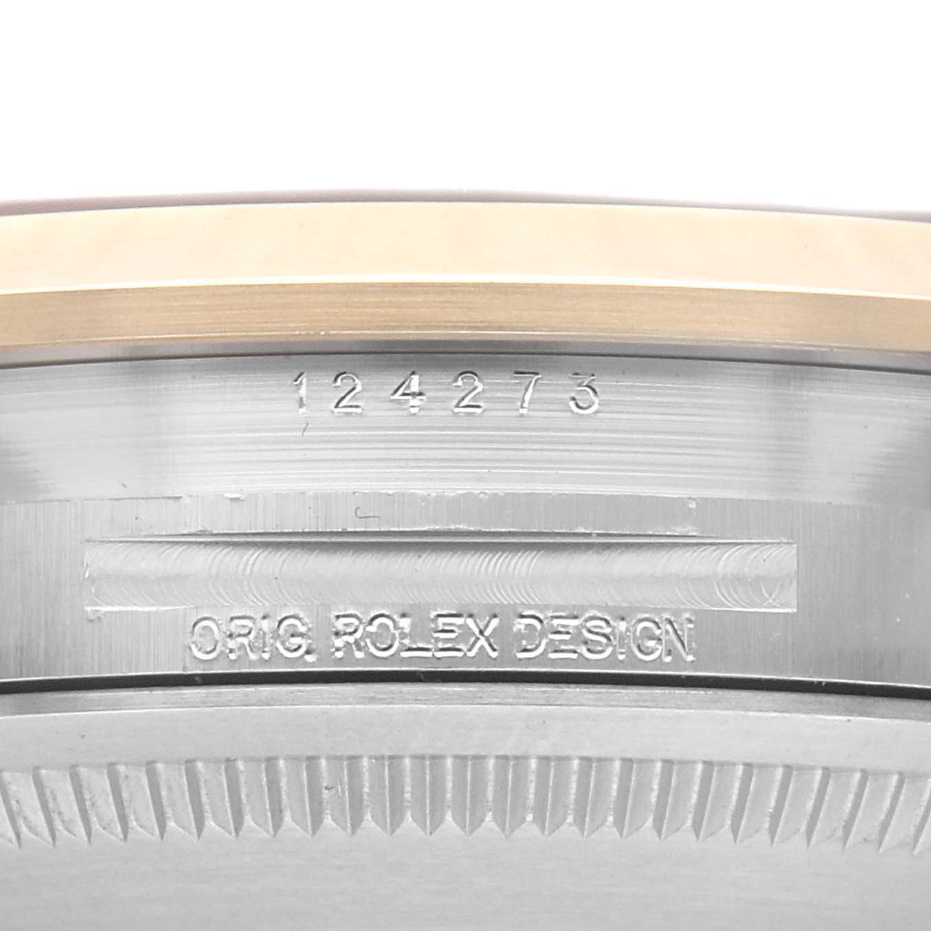 The image shows the side view of a Rolex Explorer 124273 Men's Steel and Gold (two tone) Black Dial 124273 Men's Steel and Gold (two tone) Black Dial, highlighting the model number and "Orig. Rolex Design" on the case.