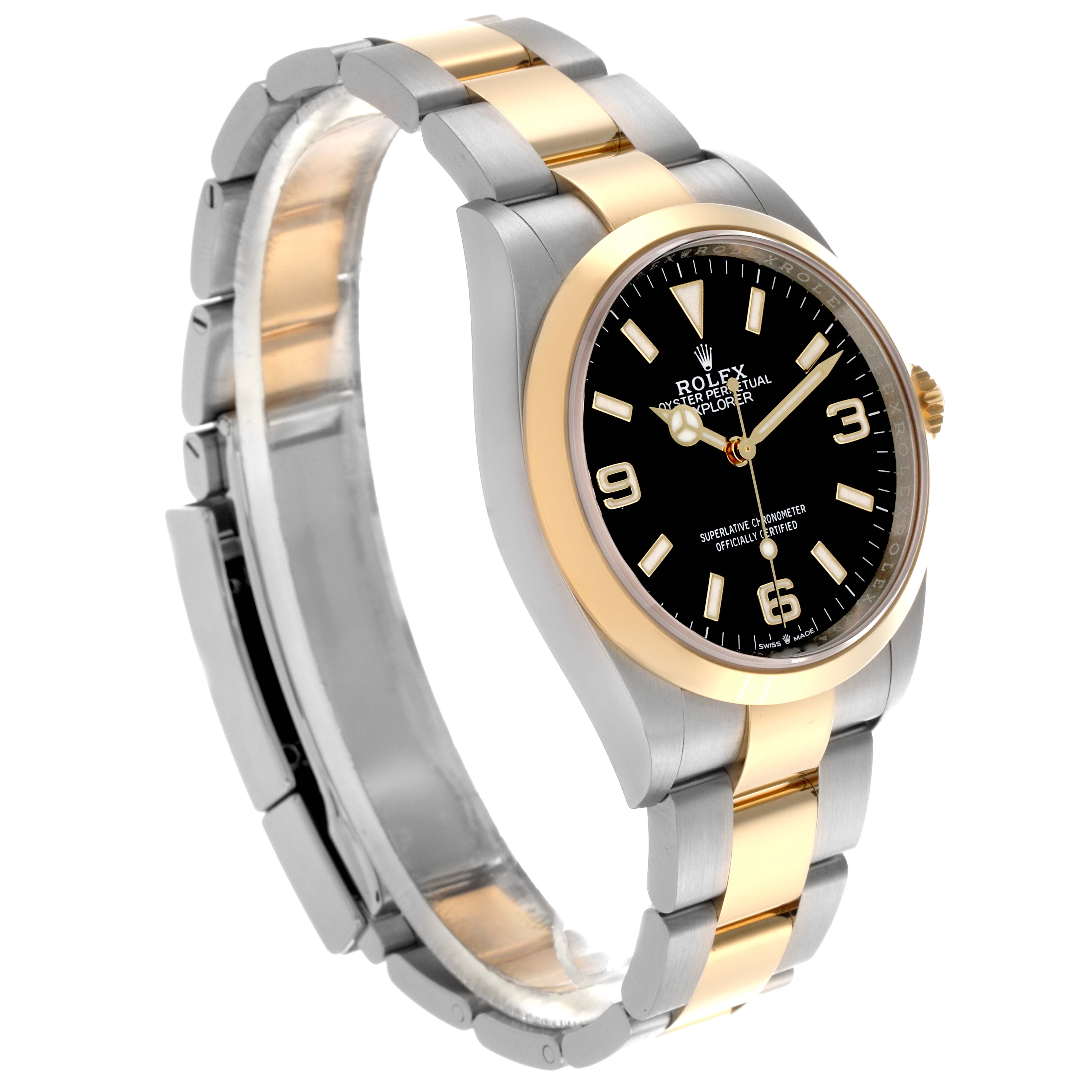 The Rolex Explorer 124273 Men's Steel and Gold (two tone) Black Dial 124273 Men's Steel and Gold (two tone) Black Dial watch is shown at a three-quarter angle, highlighting the dial, bezel, and bracelet.
