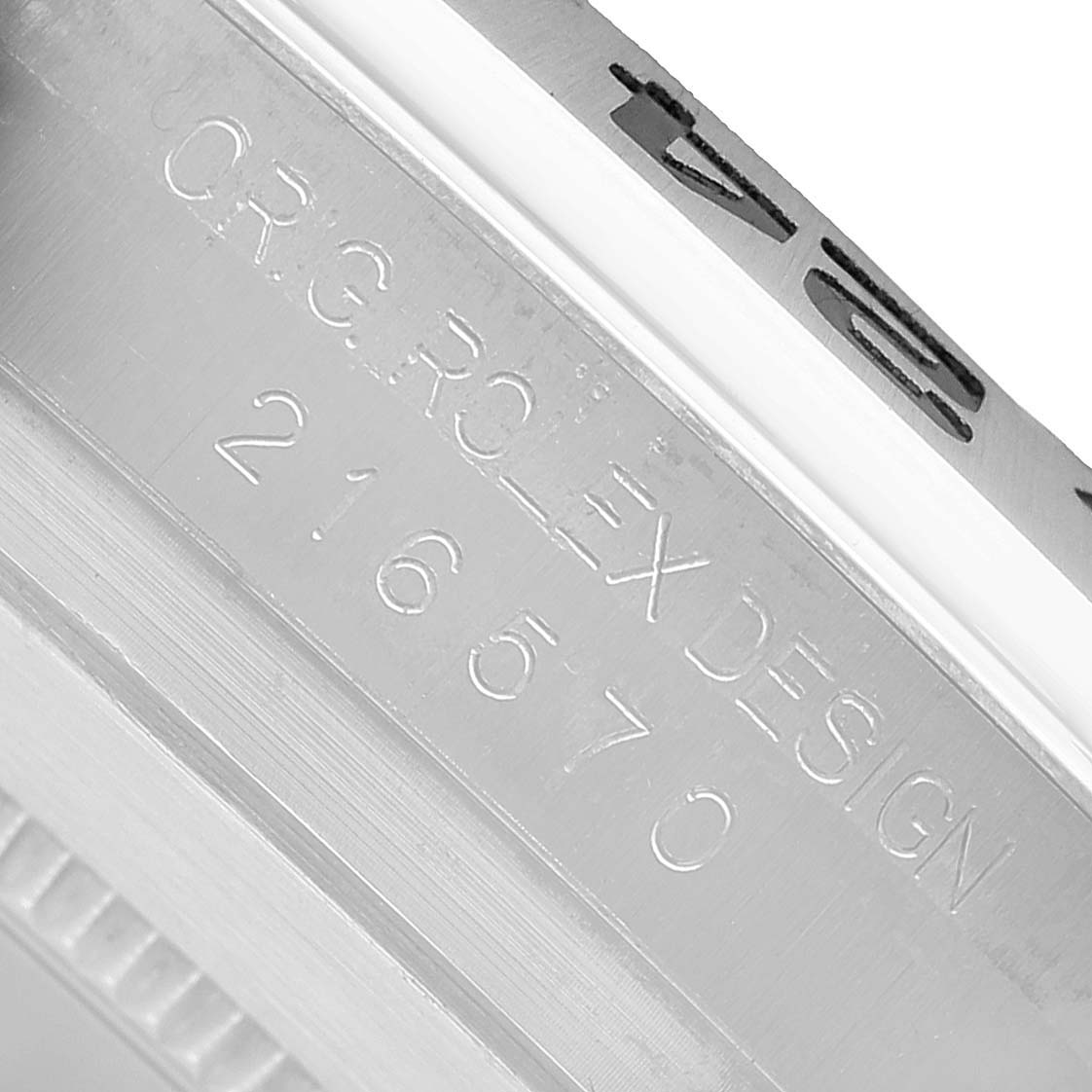 The image shows the engraved side of a Rolex Explorer 216570 Men's Stainless Steel White Dial, model number 216570.