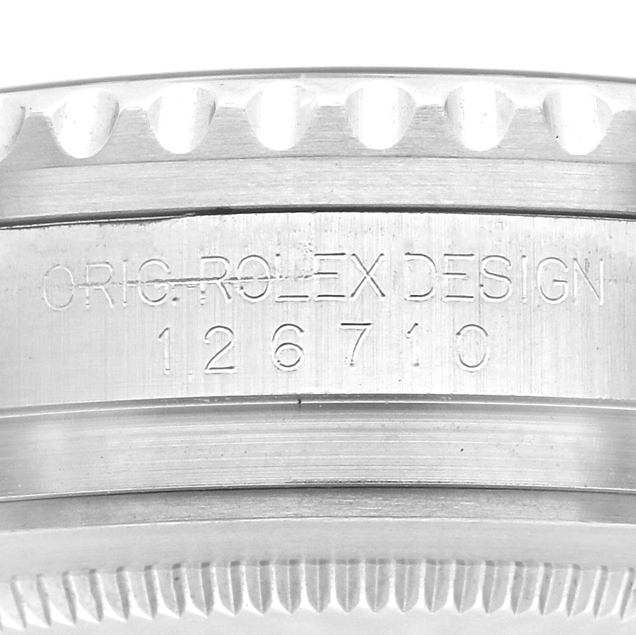 The image shows a close-up side view of the case edge and engraved model number of a Rolex GMT-Master 126710 Men's Stainless Steel Black Dial 126710 Men's Stainless Steel Black Dial watch.