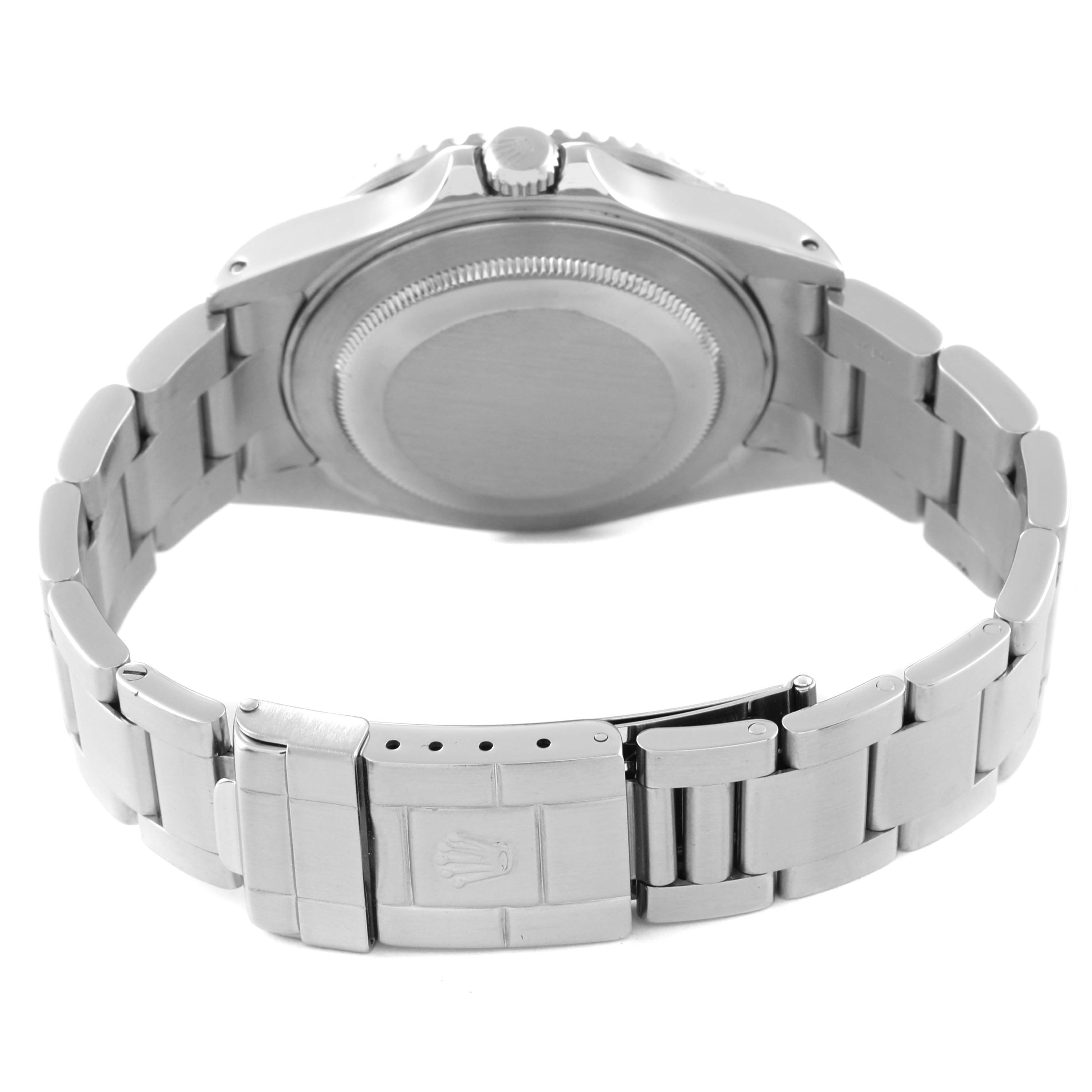 This image shows the backside and bracelet of a Rolex GMT-Master 16710 Men
s Stainless Steel Black Dial 16710 Men
s Stainless Steel Black Dial watch, highlighting the clasp with the Rolex logo.