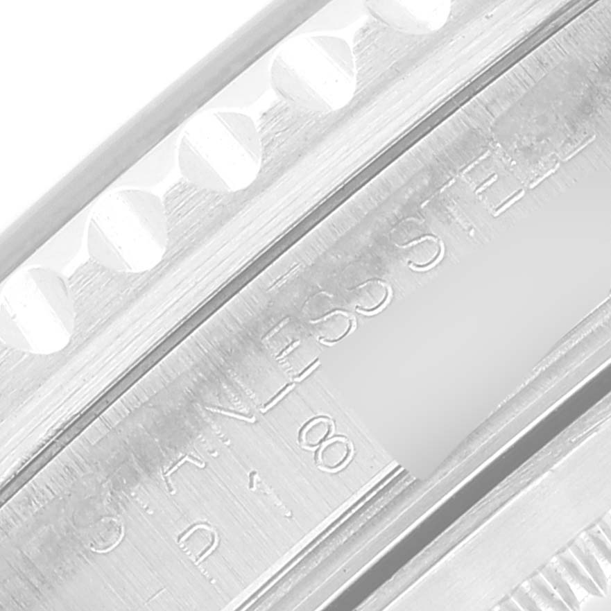 This close-up image shows the inner markings and knurled bezel edge of a Rolex GMT-Master 16710 Men
s Stainless Steel Black Dial 16710 Men
s Stainless Steel Black Dial watch.