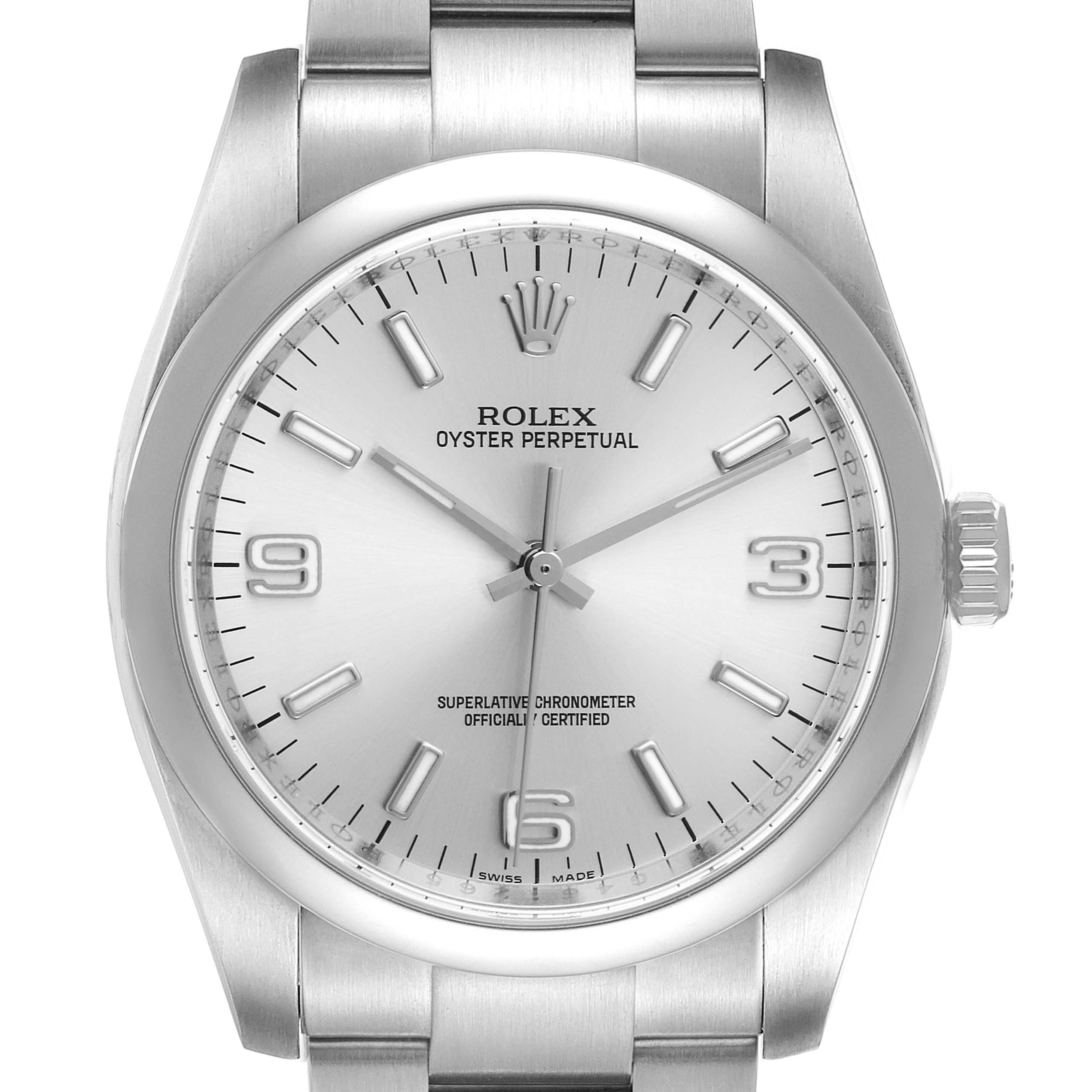 The image shows a frontal view of a Rolex Oyster Perpetual 116000 Men's Stainless Steel Silver Dial 116000 Men's Stainless Steel Silver Dial watch, focusing on the dial, bezel, and part of the bracelet.