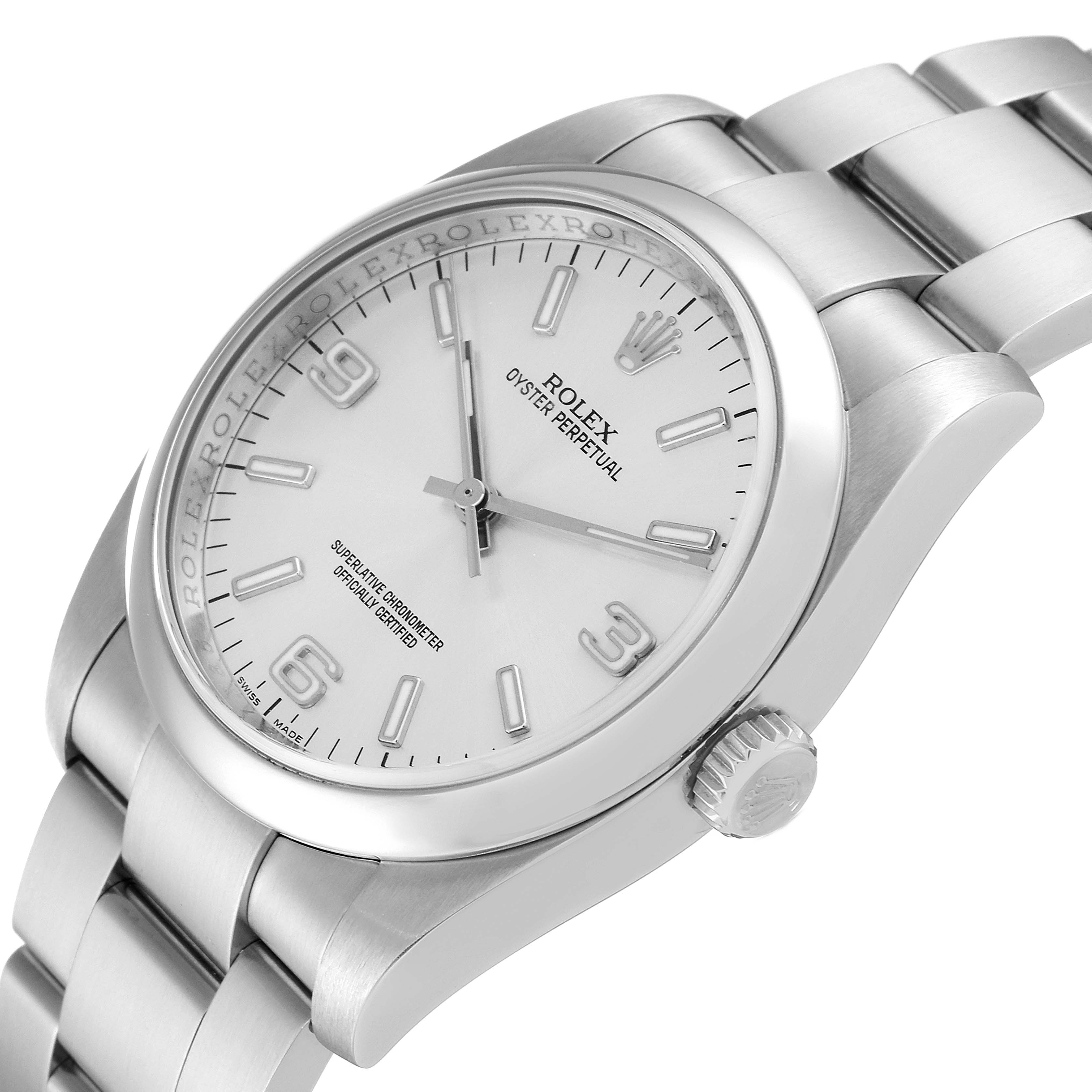 This image shows the dial, bezel, crown, and part of the bracelet of a Rolex Oyster Perpetual 116000 Men's Stainless Steel Silver Dial 116000 Men's Stainless Steel Silver Dial watch at an angled view.