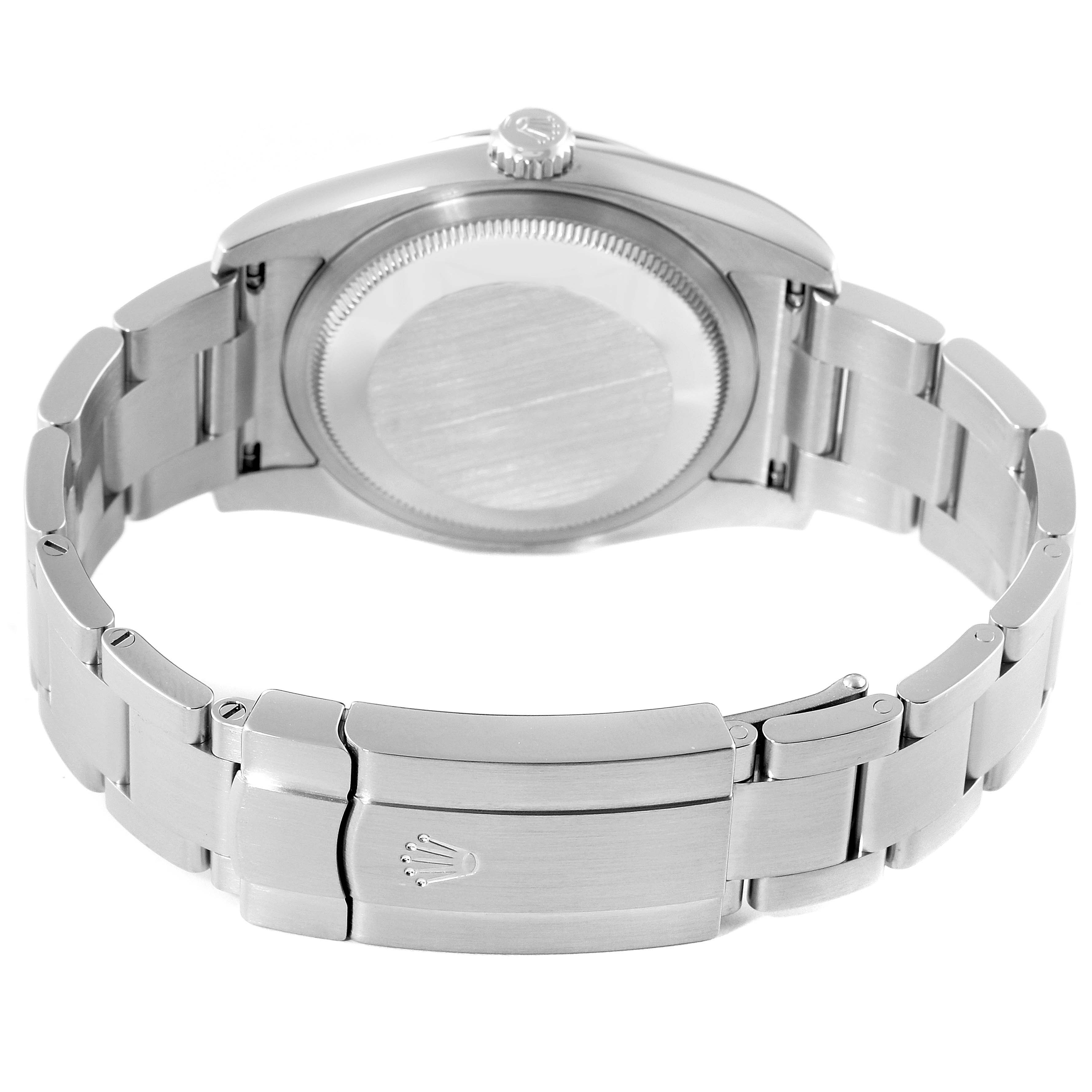 The image shows the back and clasp of a Rolex Oyster Perpetual 116000 Men's Stainless Steel Silver Dial 116000 Men's Stainless Steel Silver Dial watch, highlighting the stainless steel bracelet and crown logo.