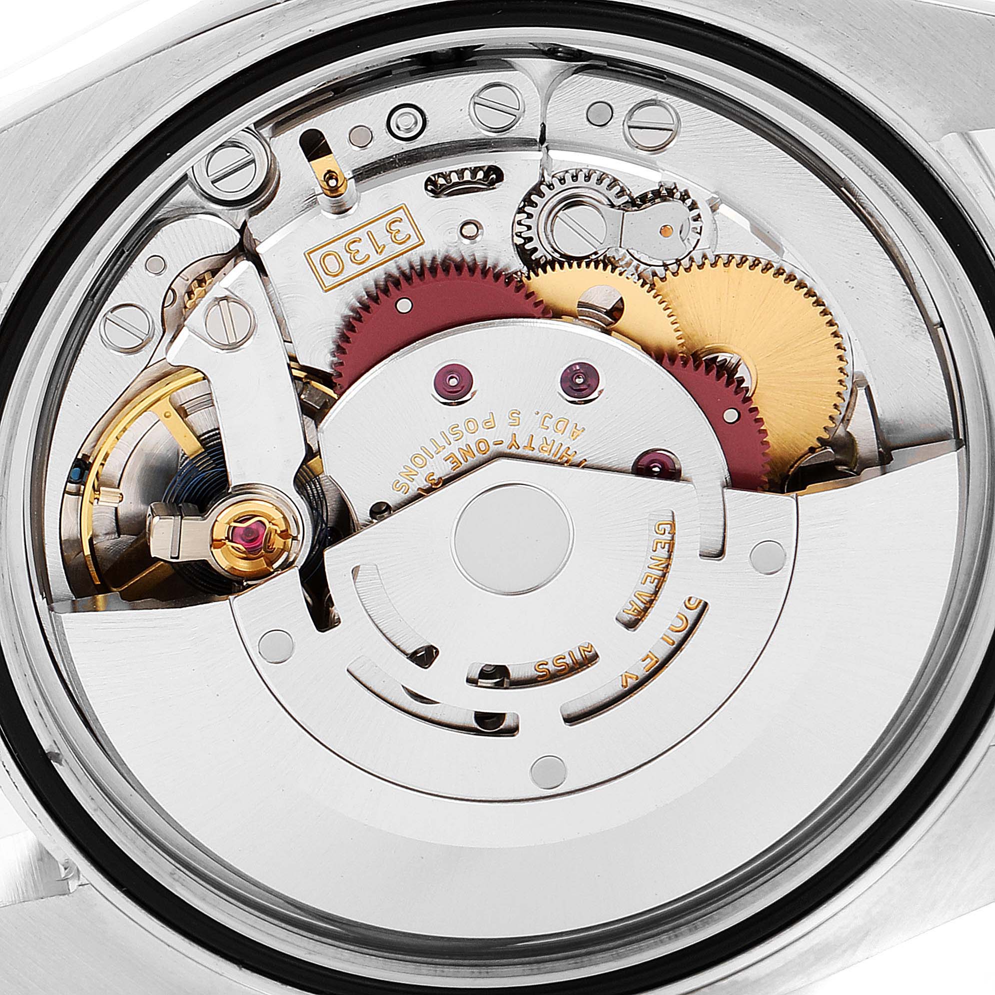 This is a close-up view of the movement inside the Rolex Oyster Perpetual 116000 Men's Stainless Steel Silver Dial 116000 Men's Stainless Steel Silver Dial watch.