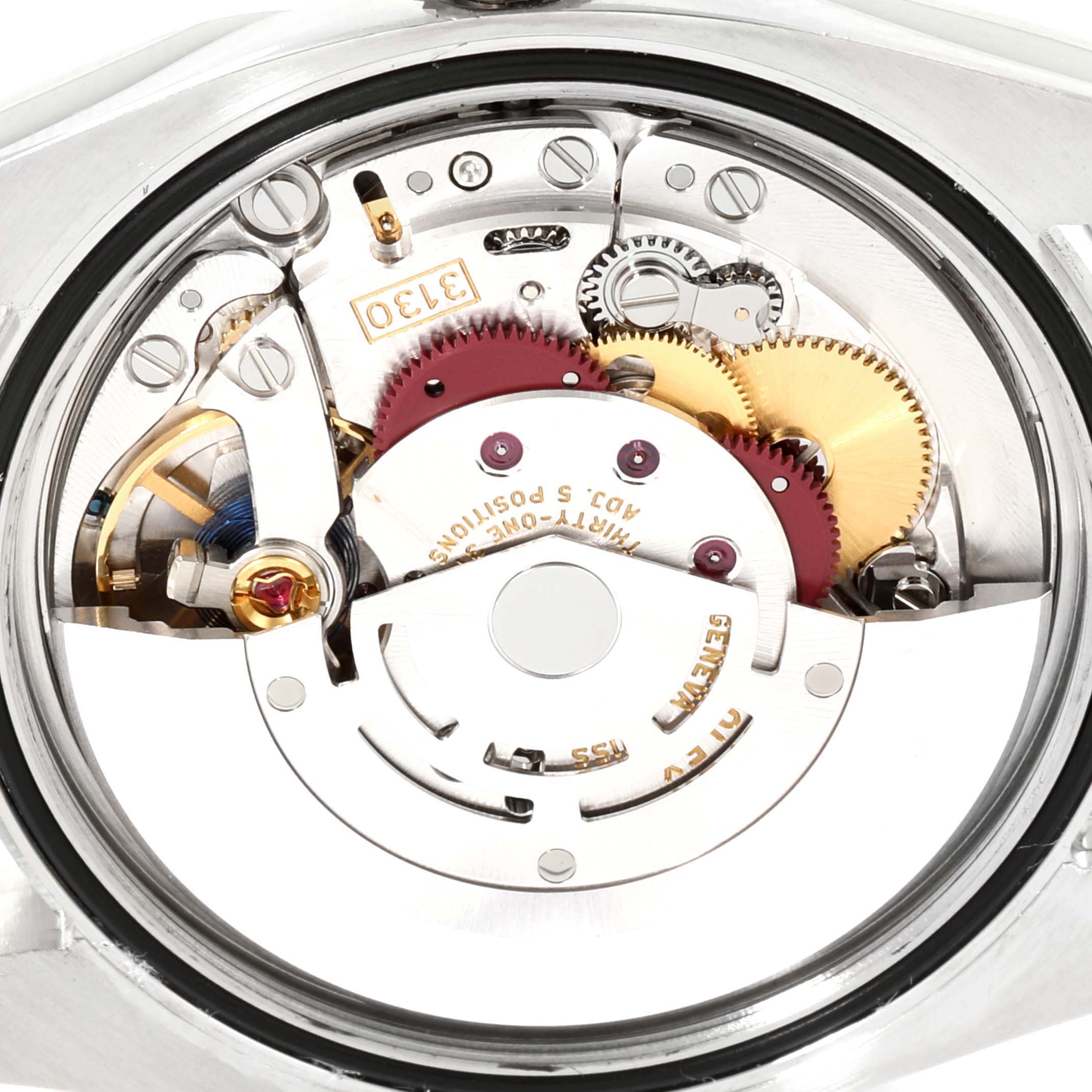 This image shows the intricate internal mechanism of a Rolex Oyster Perpetual 116000 Men's Stainless Steel Blue Dial 116000 Men's Stainless Steel Blue Dial watch from a rear angle.