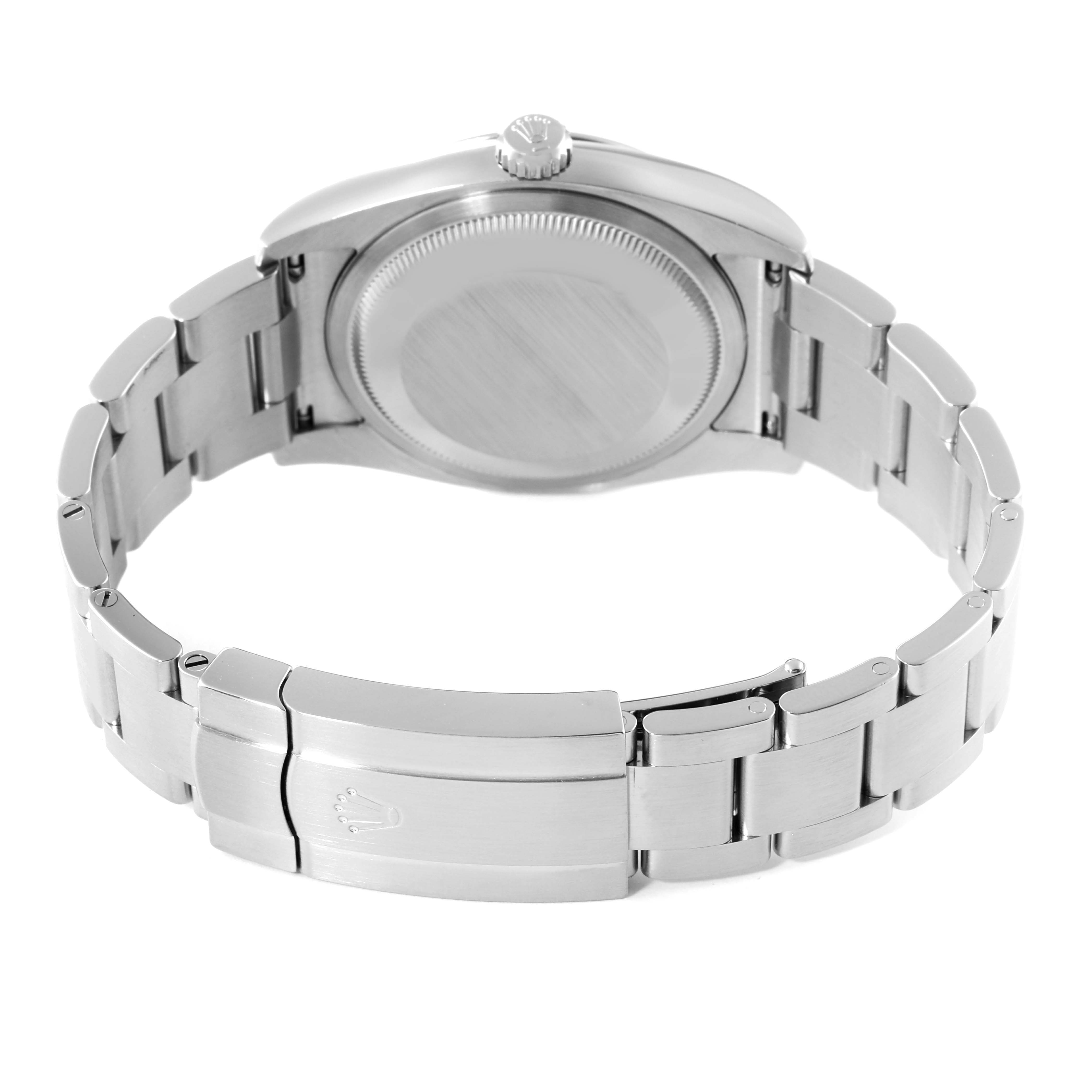 This image shows the back and bracelet of a Rolex Oyster Perpetual 116000 Men's Stainless Steel Blue Dial 116000 Men's Stainless Steel Blue Dial watch from a slightly elevated angle.