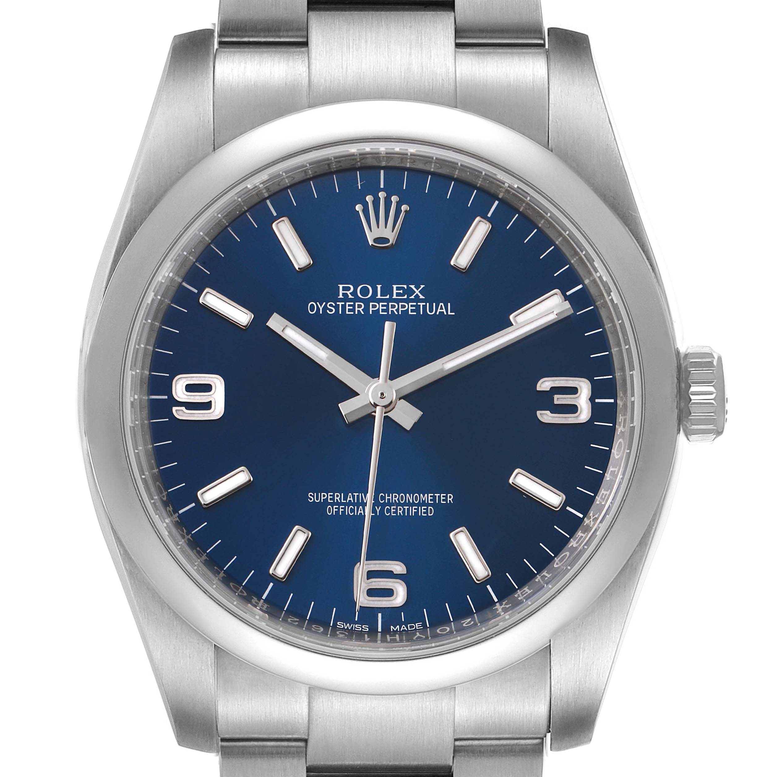 This image shows the face and partial bracelet of a Rolex Oyster Perpetual 116000 Men's Stainless Steel Blue Dial 116000 Men's Stainless Steel Blue Dial watch from a straight-on angle.