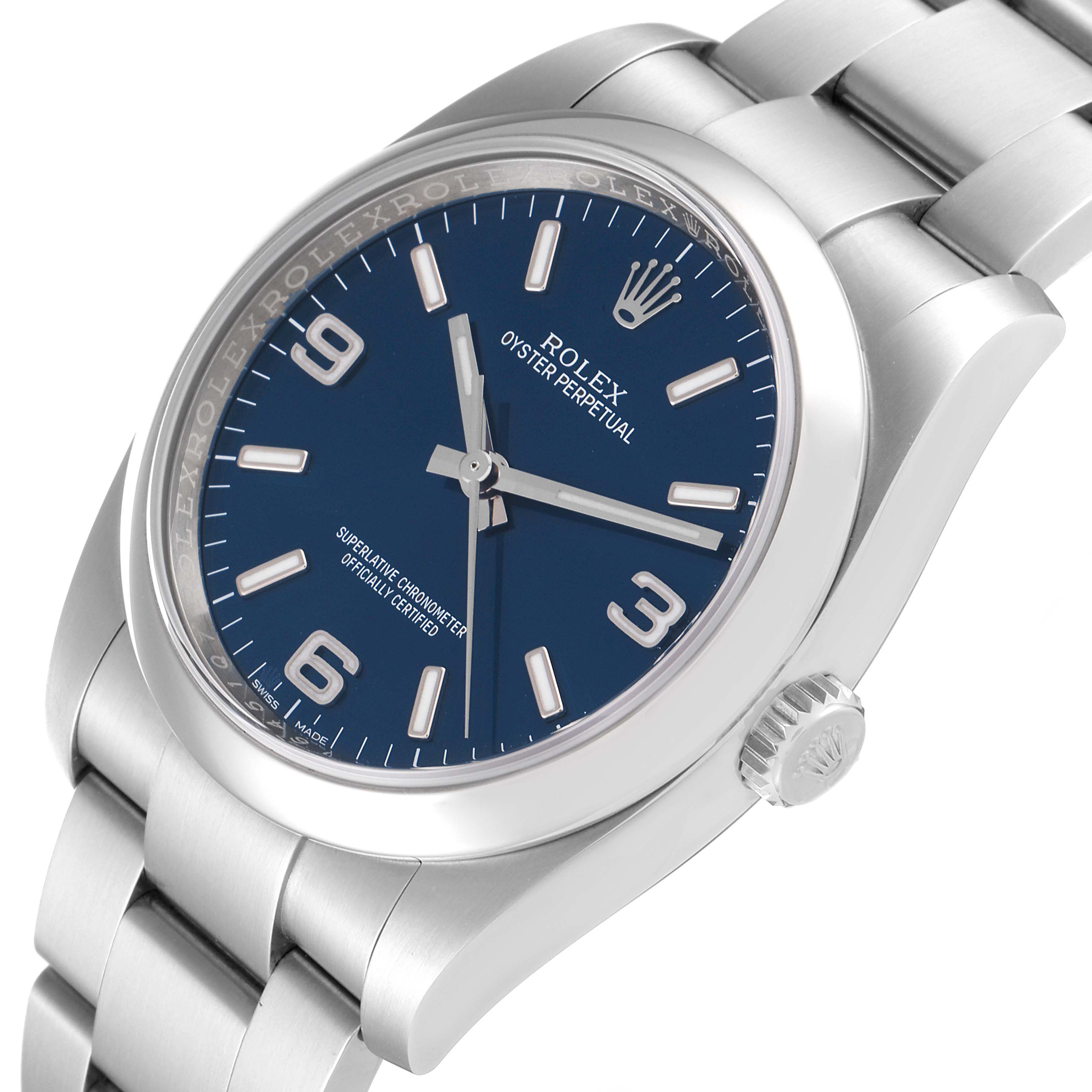 This is a close-up image of a Rolex Oyster Perpetual 116000 Men's Stainless Steel Blue Dial 116000 Men's Stainless Steel Blue Dial watch, showing the blue dial, crown, and part of the stainless steel bracelet.
