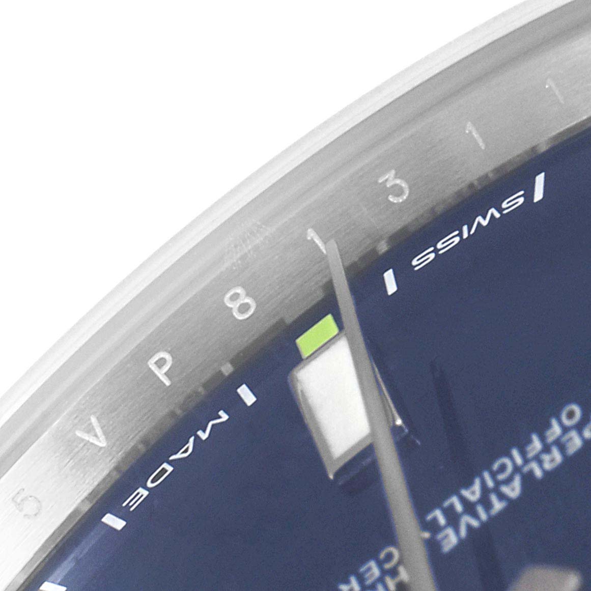 The image shows a close-up of the dial and second hand of a Rolex Oyster Perpetual 114300 Men's Stainless Steel Blue Dial 114300 Men's Stainless Steel Blue Dial watch.