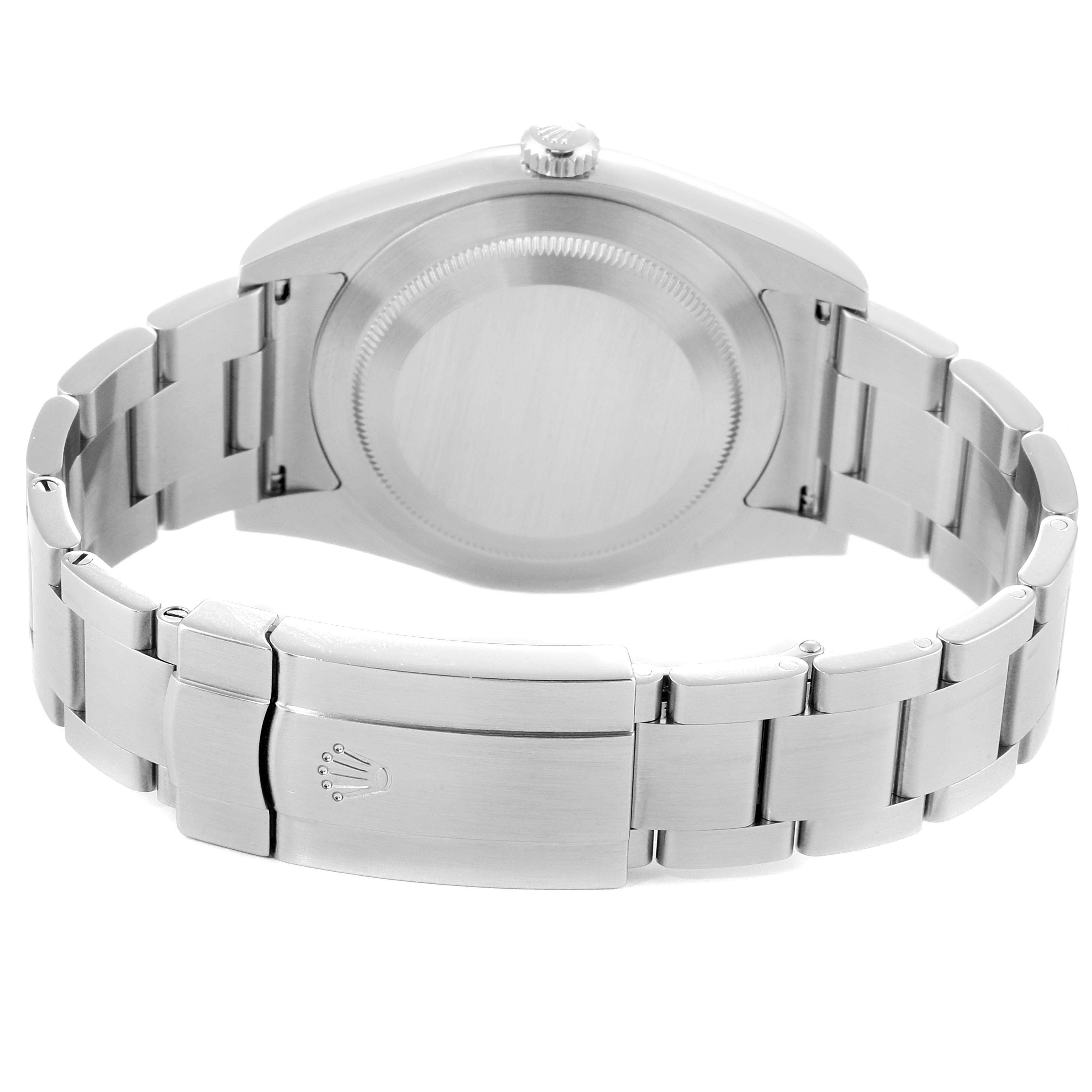 This image shows the back side and bracelet of a Rolex Oyster Perpetual 114300 Men's Stainless Steel Blue Dial 114300 Men's Stainless Steel Blue Dial watch.