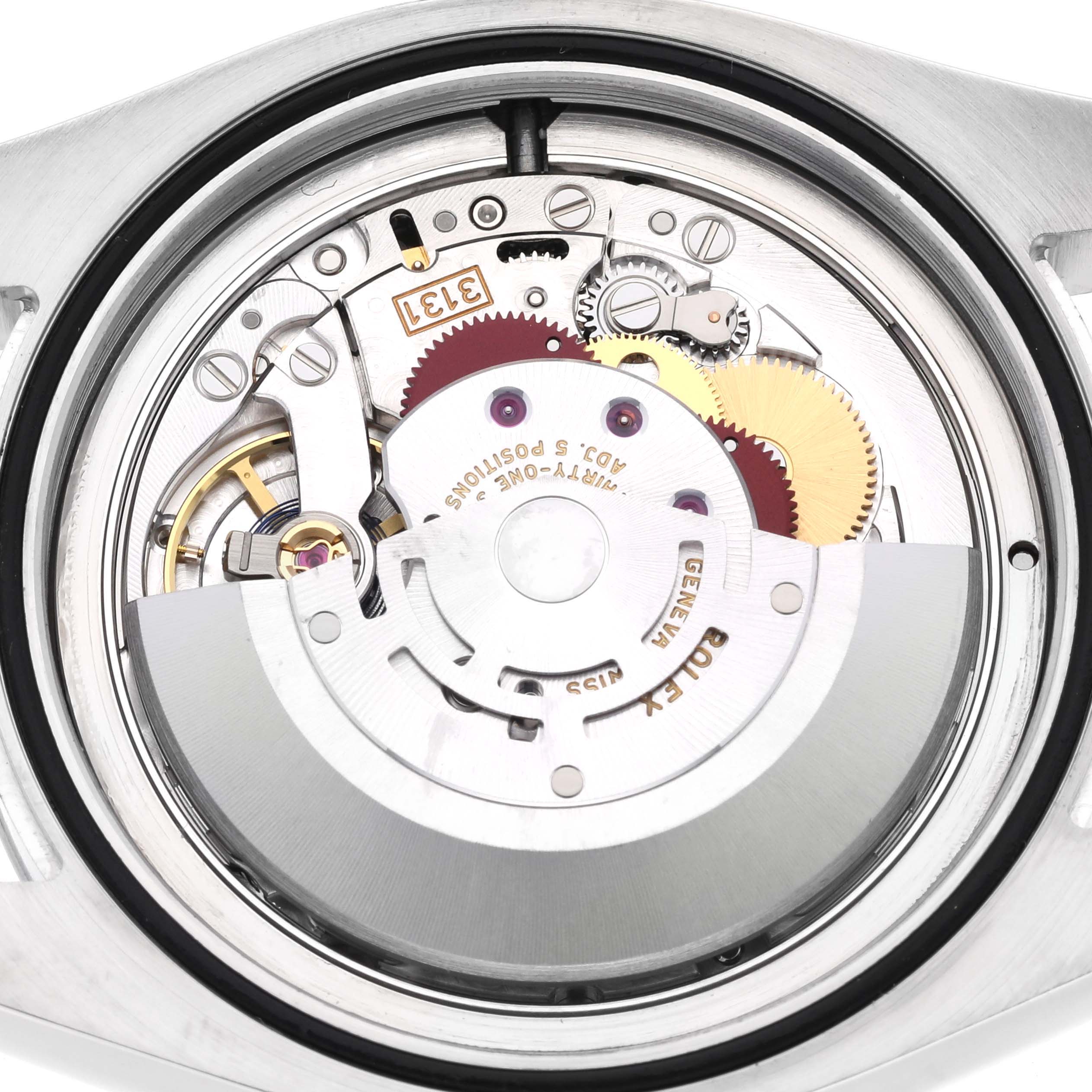The image shows the internal mechanism of a Rolex Air-King 116900 Men's Stainless Steel Black Dial 116900 Men's Stainless Steel Black Dial, focusing on the movement from a top-down angle.