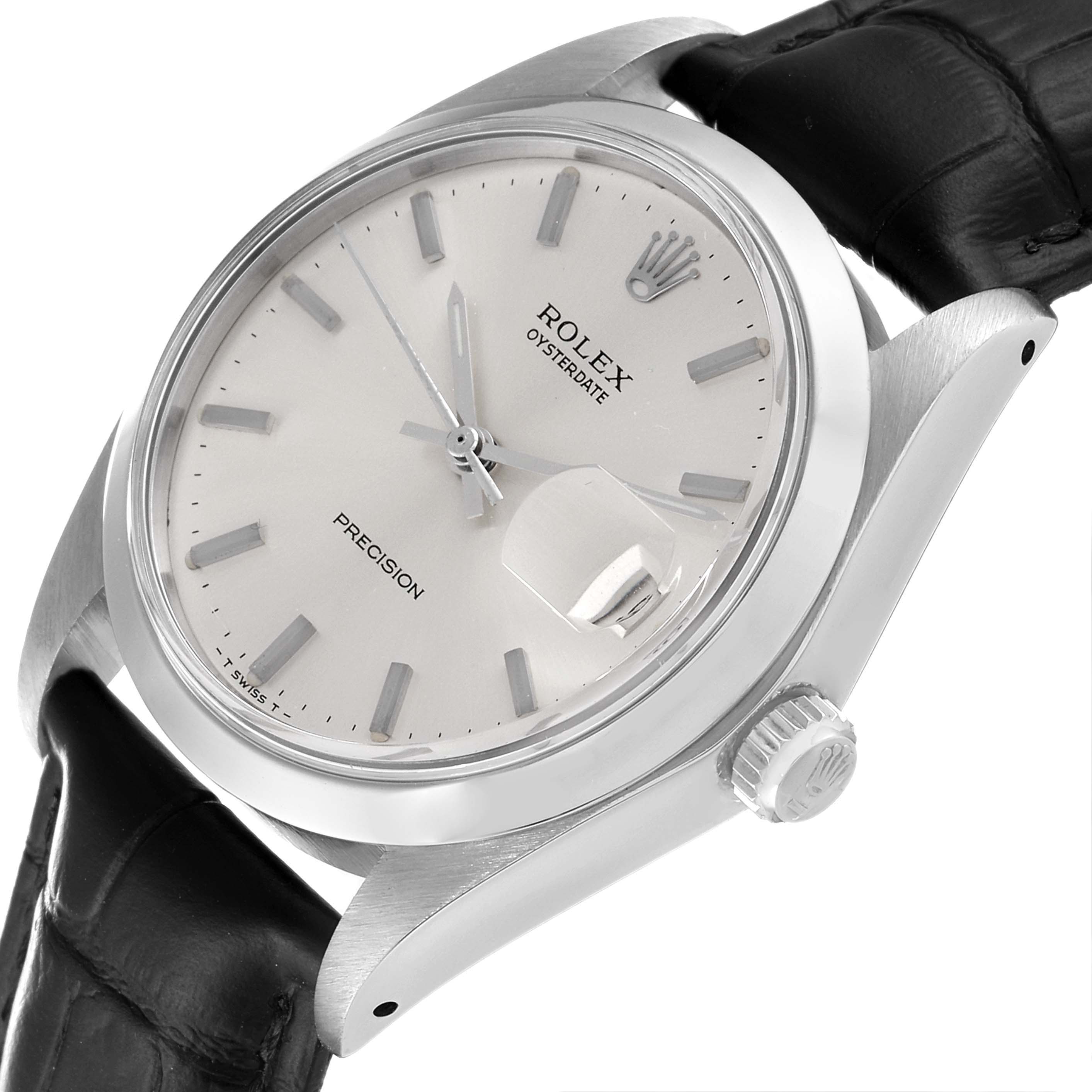 The image shows a close-up angled view of the Rolex Date 6694 Men's Stainless Steel Silver Dial 6694 Men's Stainless Steel Silver Dial watch, displaying the dial, case, crown, and part of the leather strap.