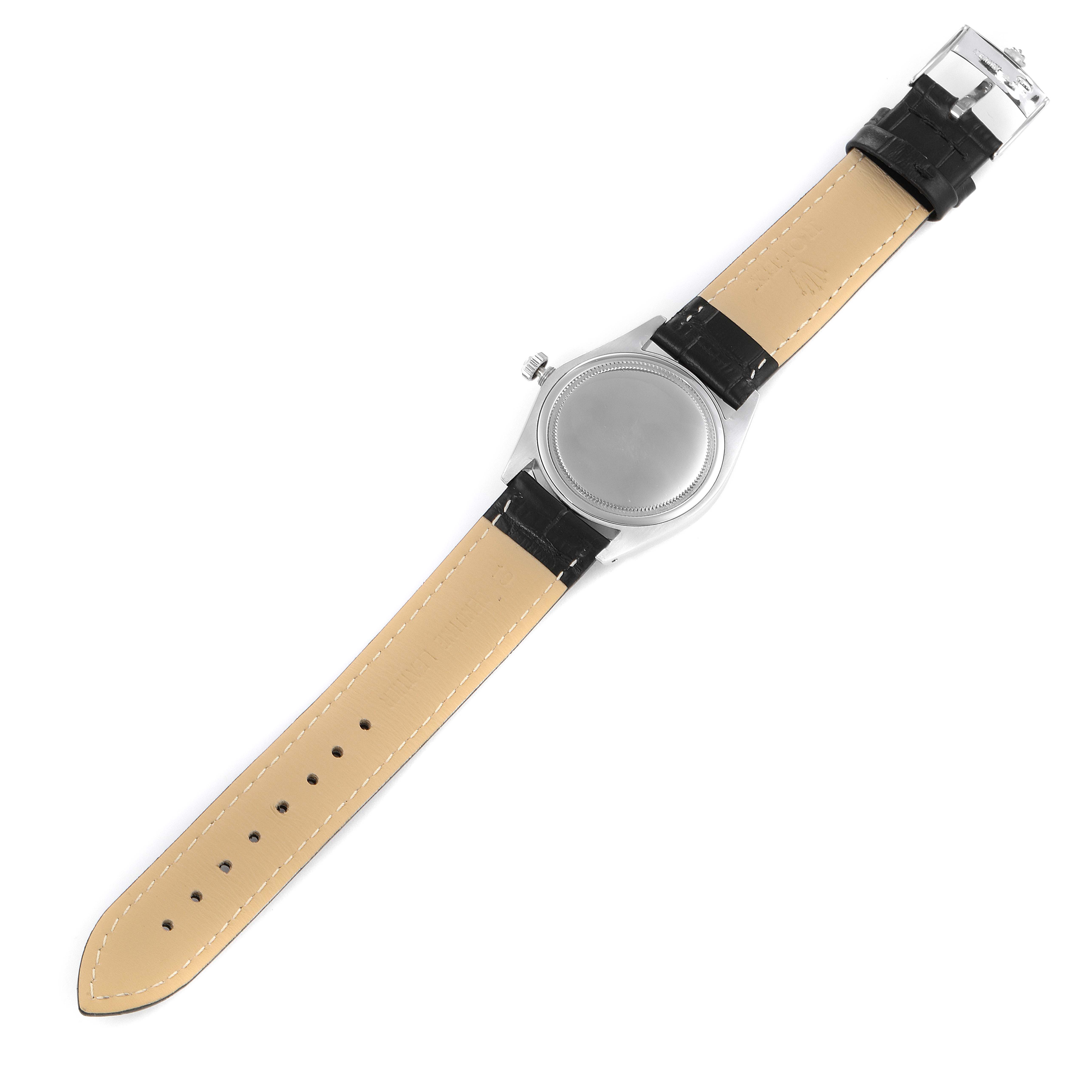 This image shows the back view of a Rolex Date 6694 Men's Stainless Steel Silver Dial 6694 Men's Stainless Steel Silver Dial watch, displaying the case back and leather straps.