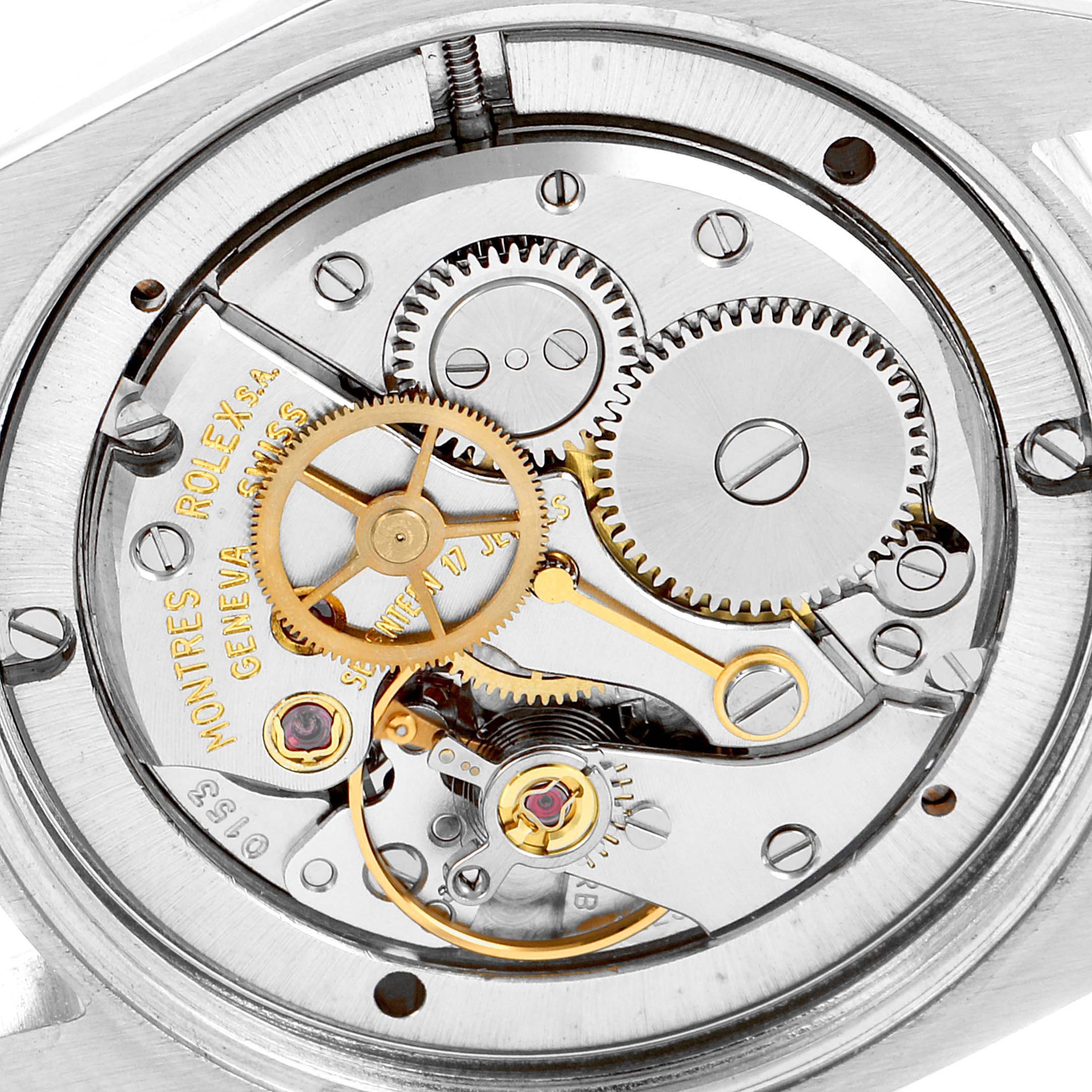 The image shows a close-up of the movement mechanism inside a Rolex Vintage Collection 6694 Men's Stainless Steel Silver Dial 6694 Men's Stainless Steel Silver Dial watch.