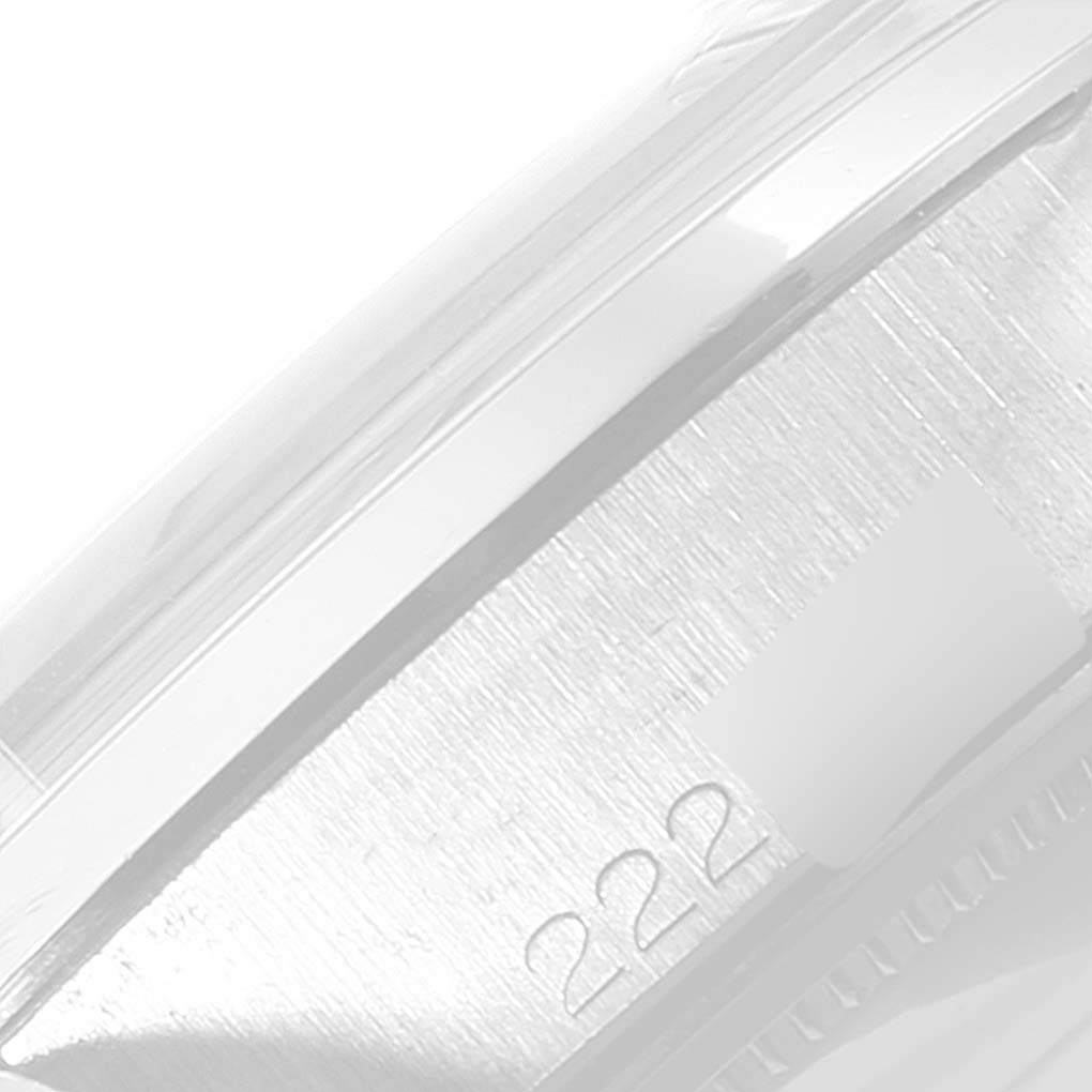 This image shows a close-up of the side of the Rolex Vintage Collection 6694 Men's Stainless Steel Silver Dial 6694 Men's Stainless Steel Silver Dial watch, focusing on its brushed metal case and part of its bezel.