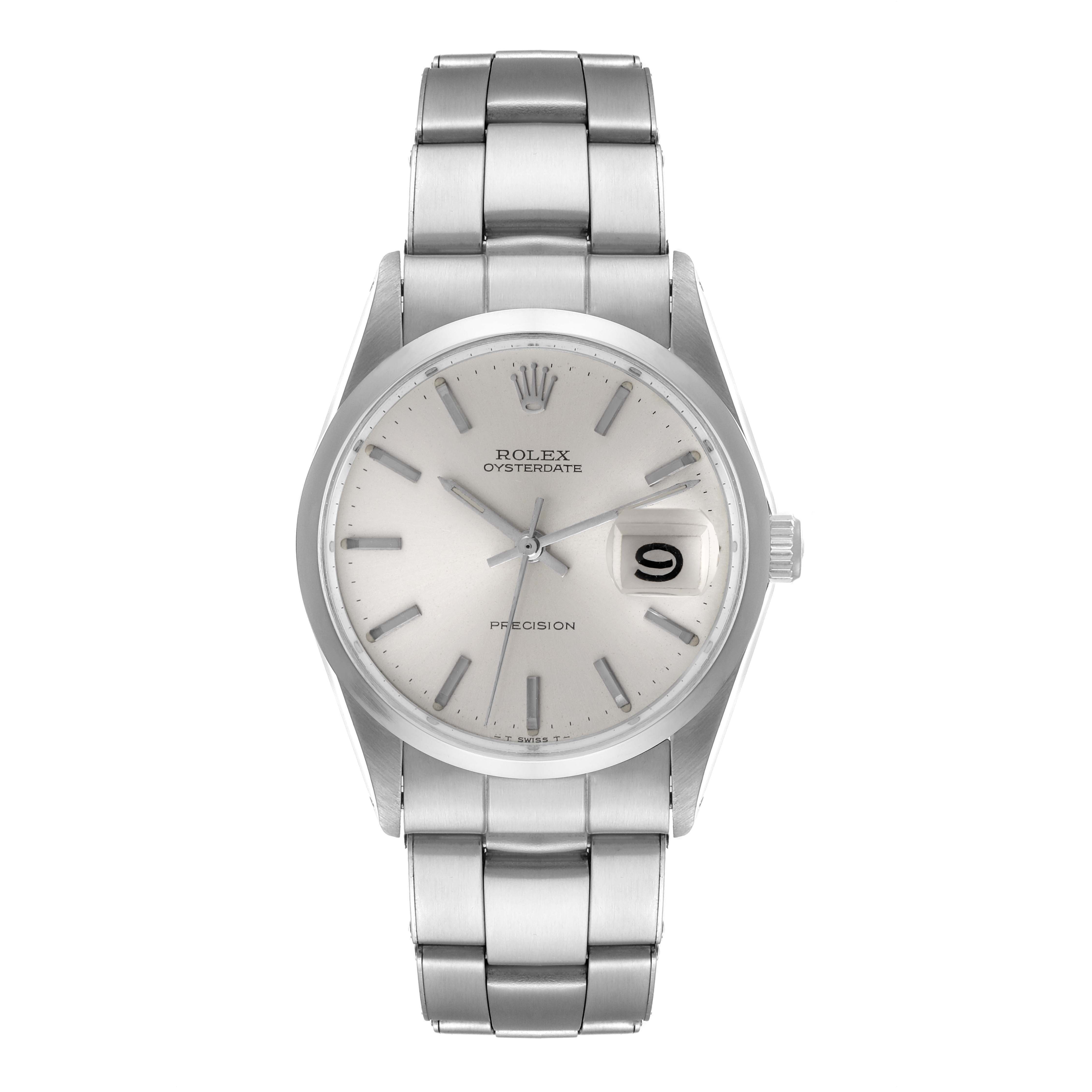 The image shows a front view of a Rolex Oysterdate Precision watch, a model from the Vintage Collection, displaying its silver face and bracelet.