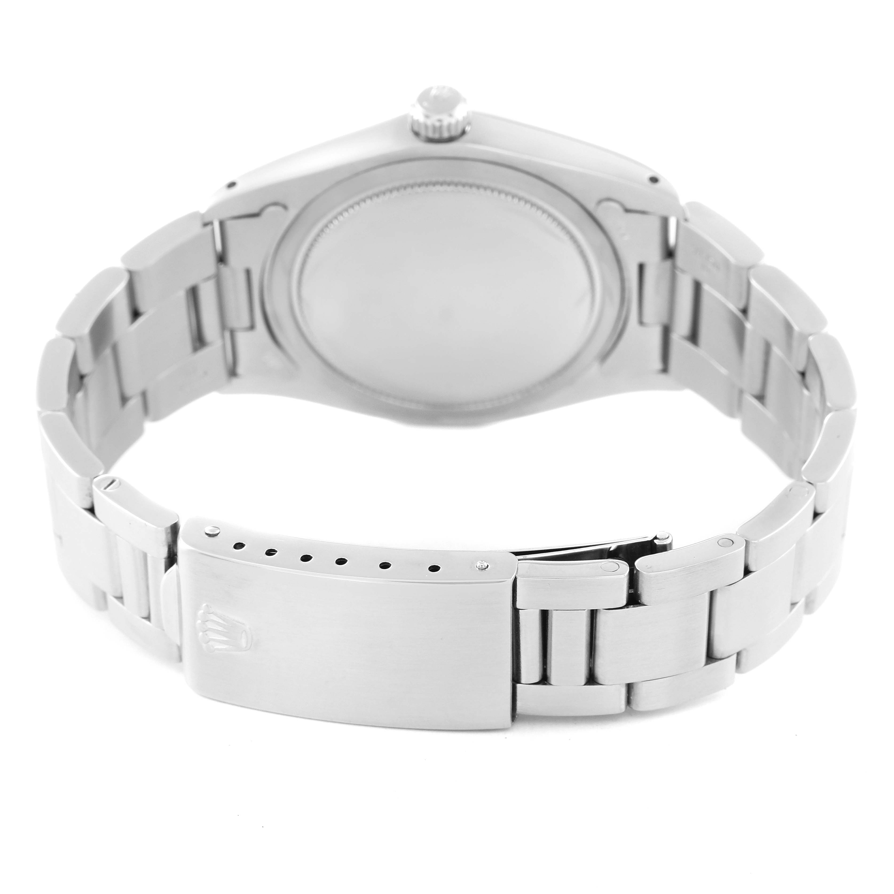 The image shows the back and clasp of a Rolex Vintage Collection 6694 Men's Stainless Steel Silver Dial 6694 Men's Stainless Steel Silver Dial watch, featuring its bracelet and caseback.