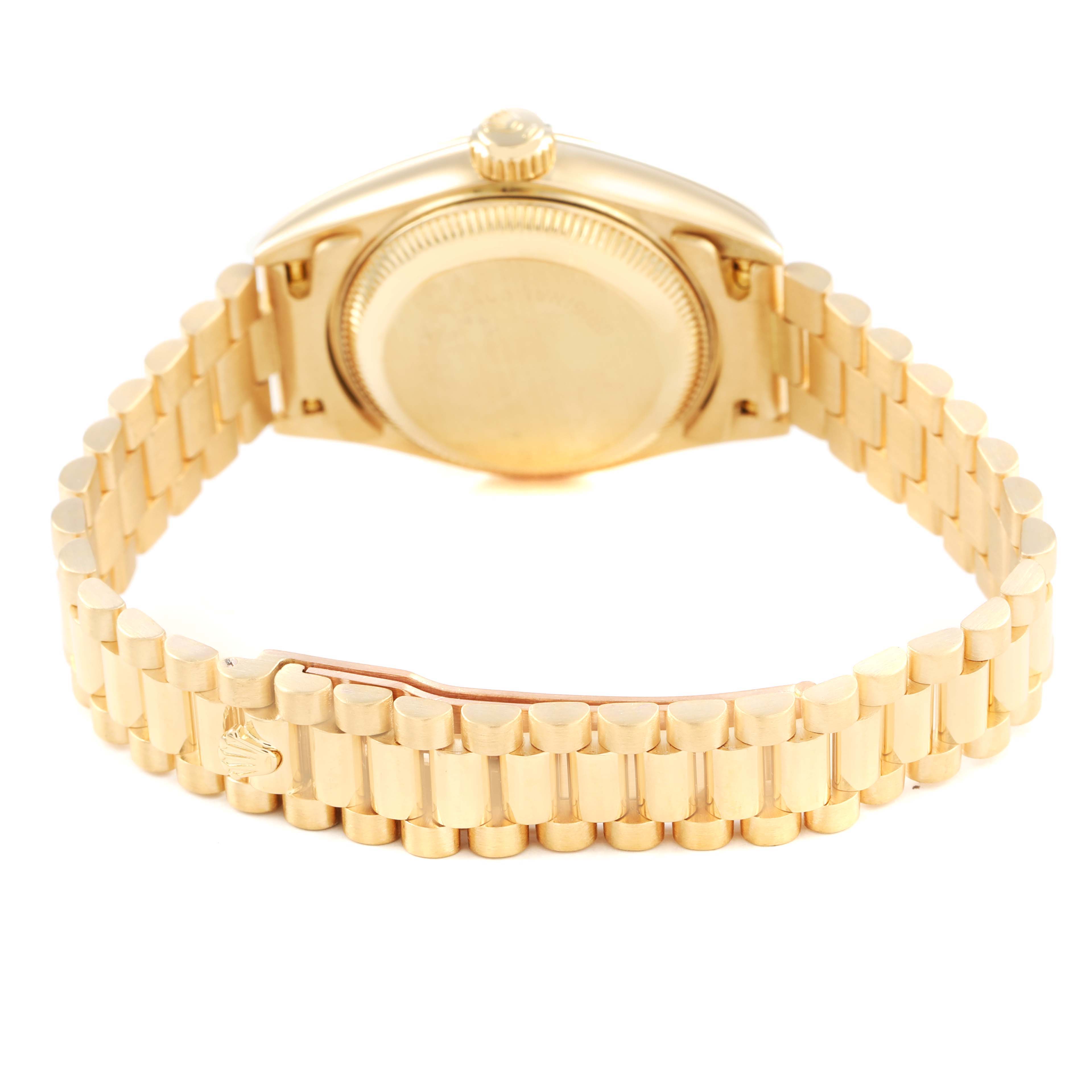 The Rolex President 69178 Women's Yellow Gold Champagne Dial watch is shown from the back, highlighting the case back and bracelet.
