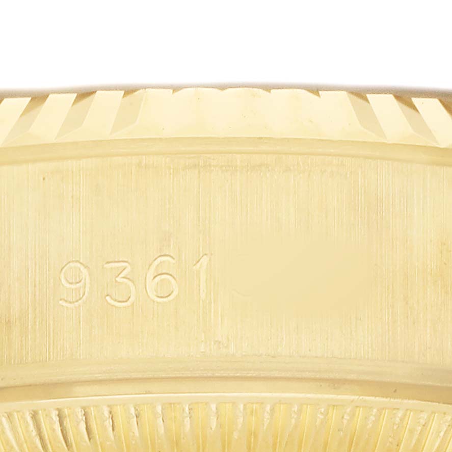 The image shows a close-up of the side and edge of the bezel and case of a Rolex President 69178 Women's Yellow Gold Champagne Dial watch.