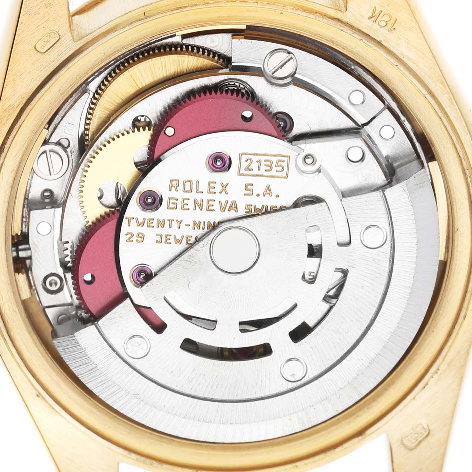 The image shows the movement of a Rolex President 69178 Women's Yellow Gold Champagne Dial watch with visible gears, rotor, and inscriptions.