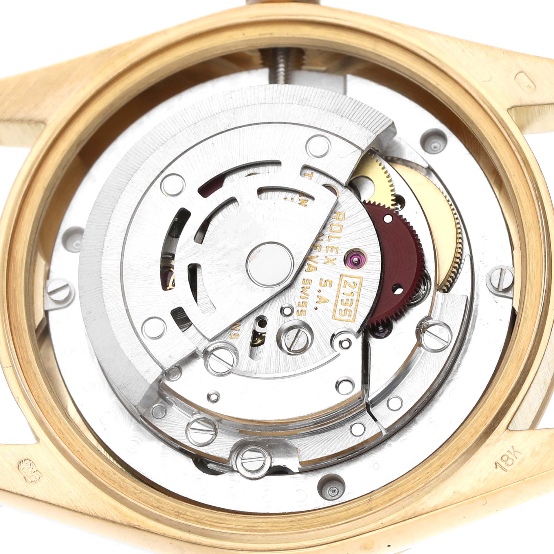 The image shows the movement mechanism of a Rolex President 68278 Women's Yellow Gold Black Dial watch, viewed from the back with detailed gears and components.