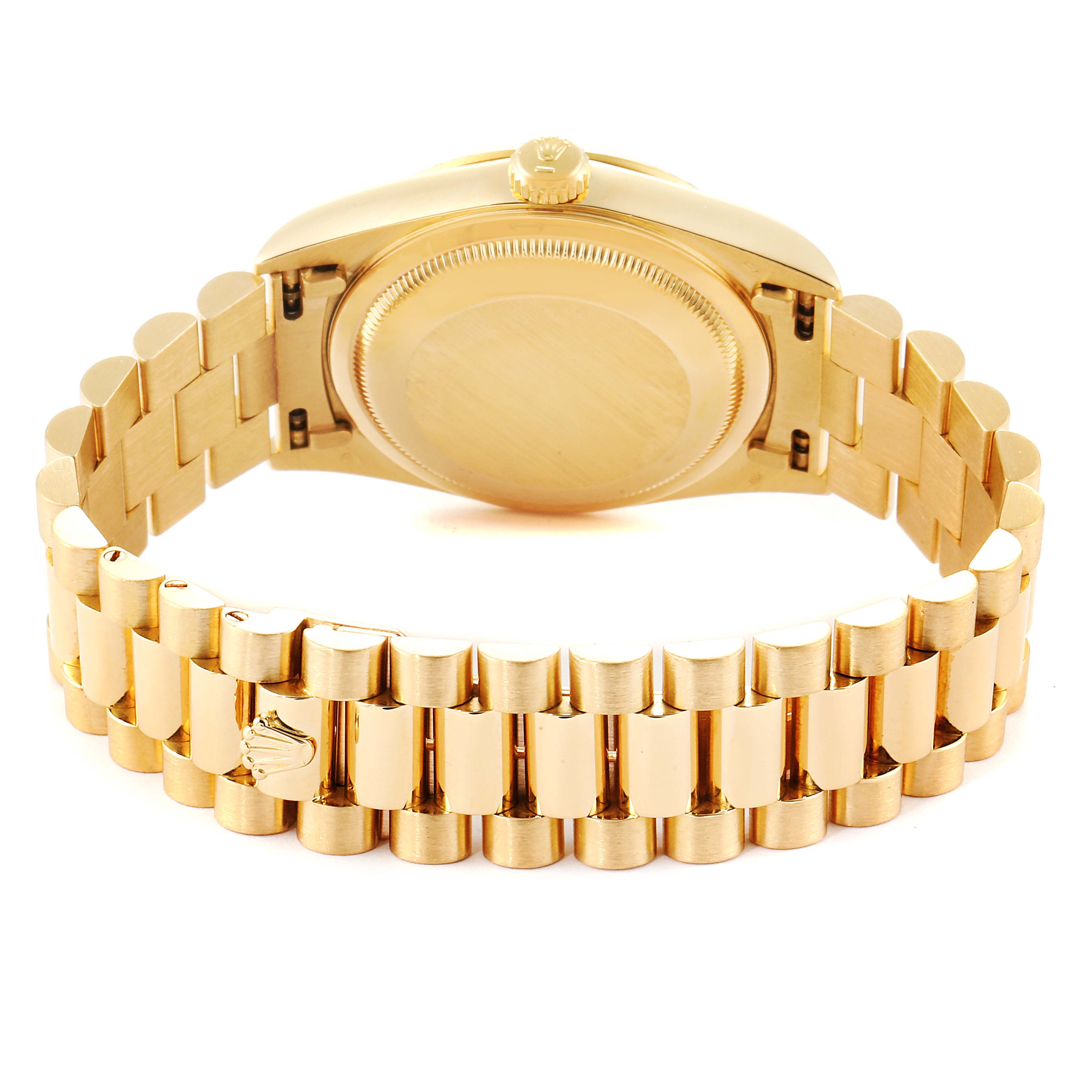 This image shows the backside and the bracelet of a Rolex President 18238 Men
s Yellow Gold Champagne Dial 18238 Men
s Yellow Gold Champagne Dial model watch.