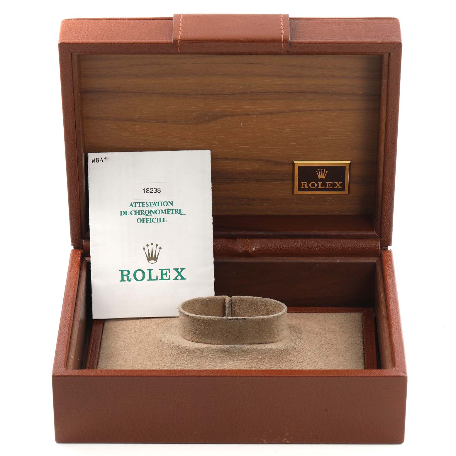 The image shows an open Rolex President 18238 Men
s Yellow Gold Champagne Dial 18238 Men
s Yellow Gold Champagne Dial model watch box with documentation and a cushion holder inside.