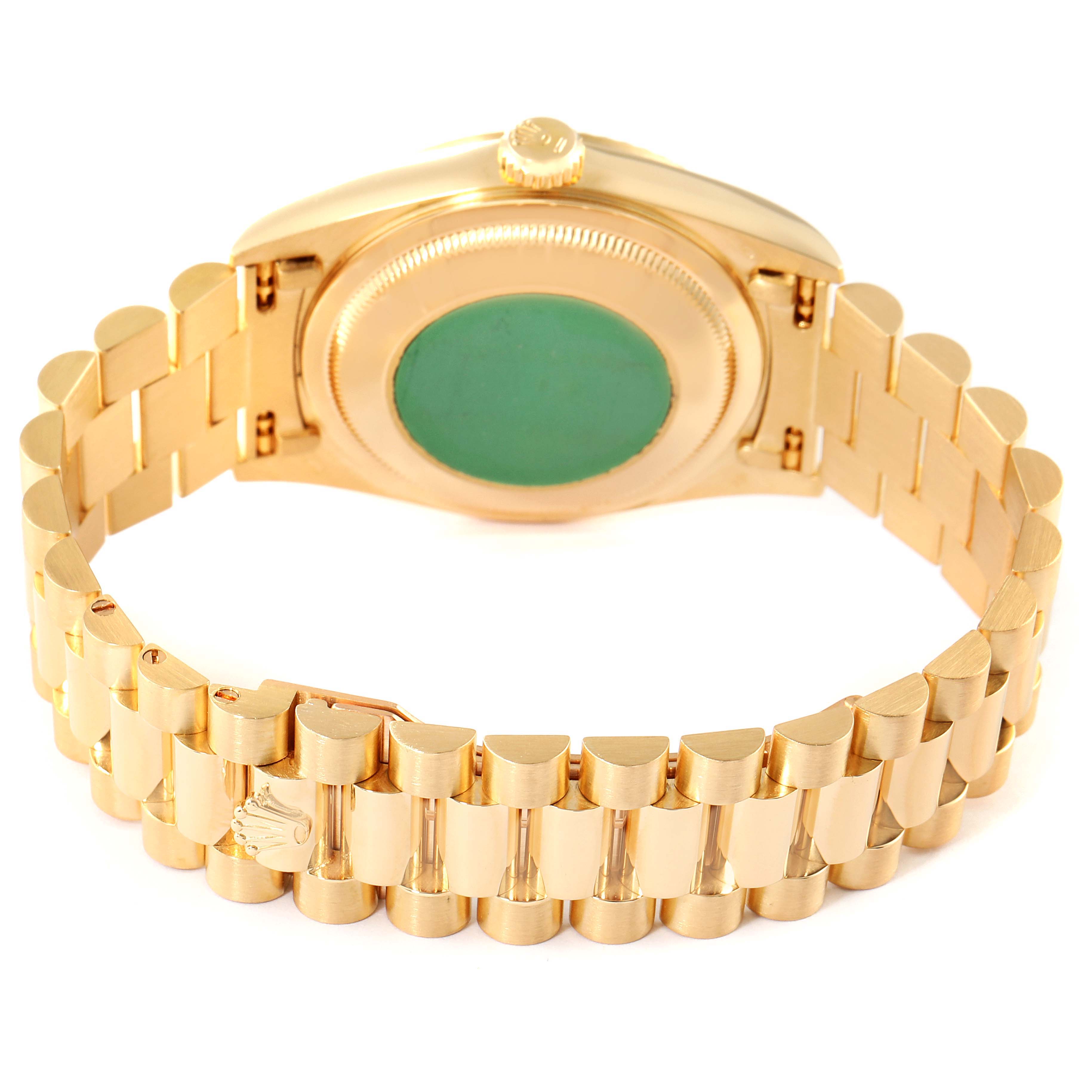 The image shows the back view of the Rolex President 18238 Men
s Yellow Gold Champagne Dial 18238 Men
s Yellow Gold Champagne Dial model watch, highlighting its bracelet and case back.