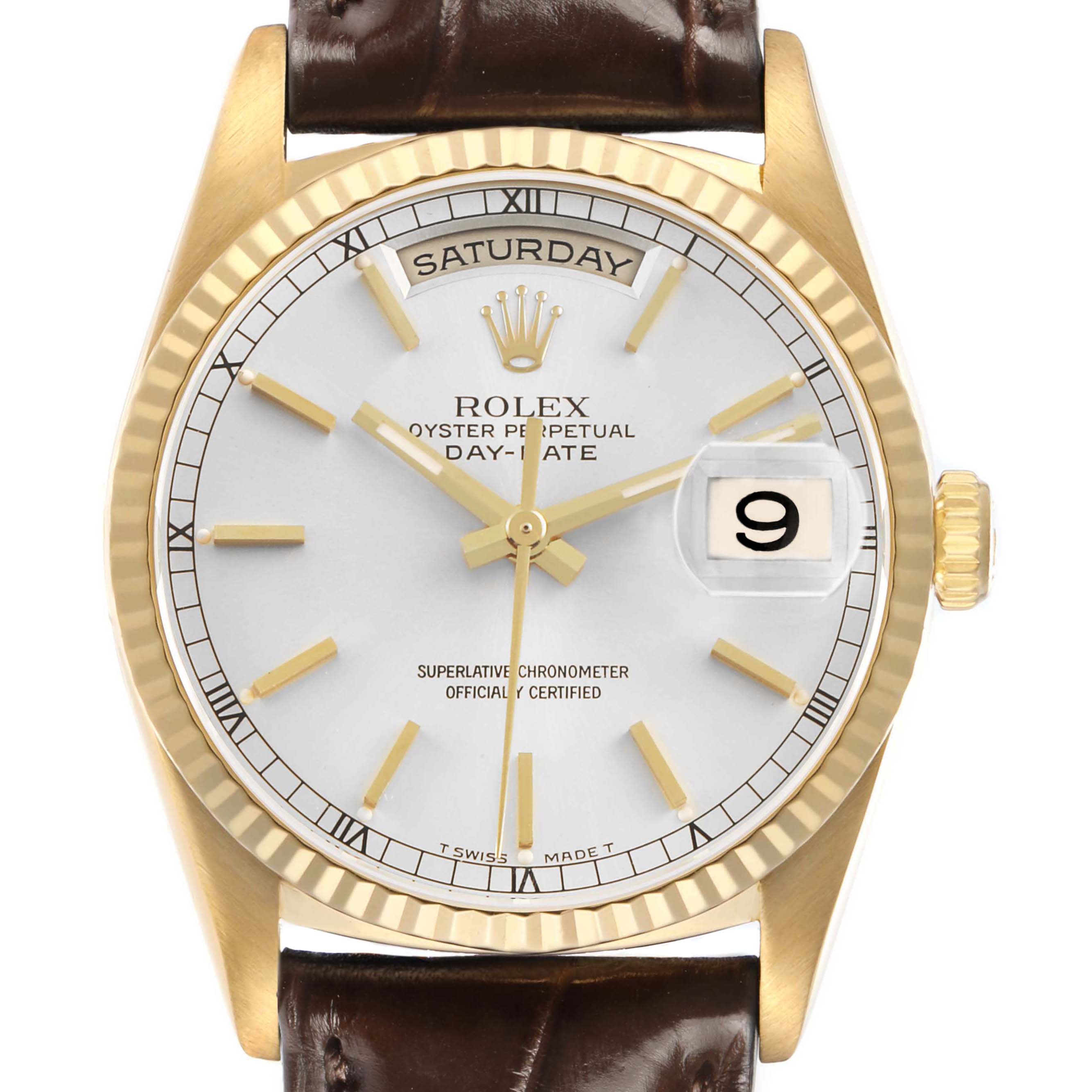The Rolex President 18238 Men's Yellow Gold Silver Dial model watch is shown from a front angle, highlighting its dial, crown, and leather strap.