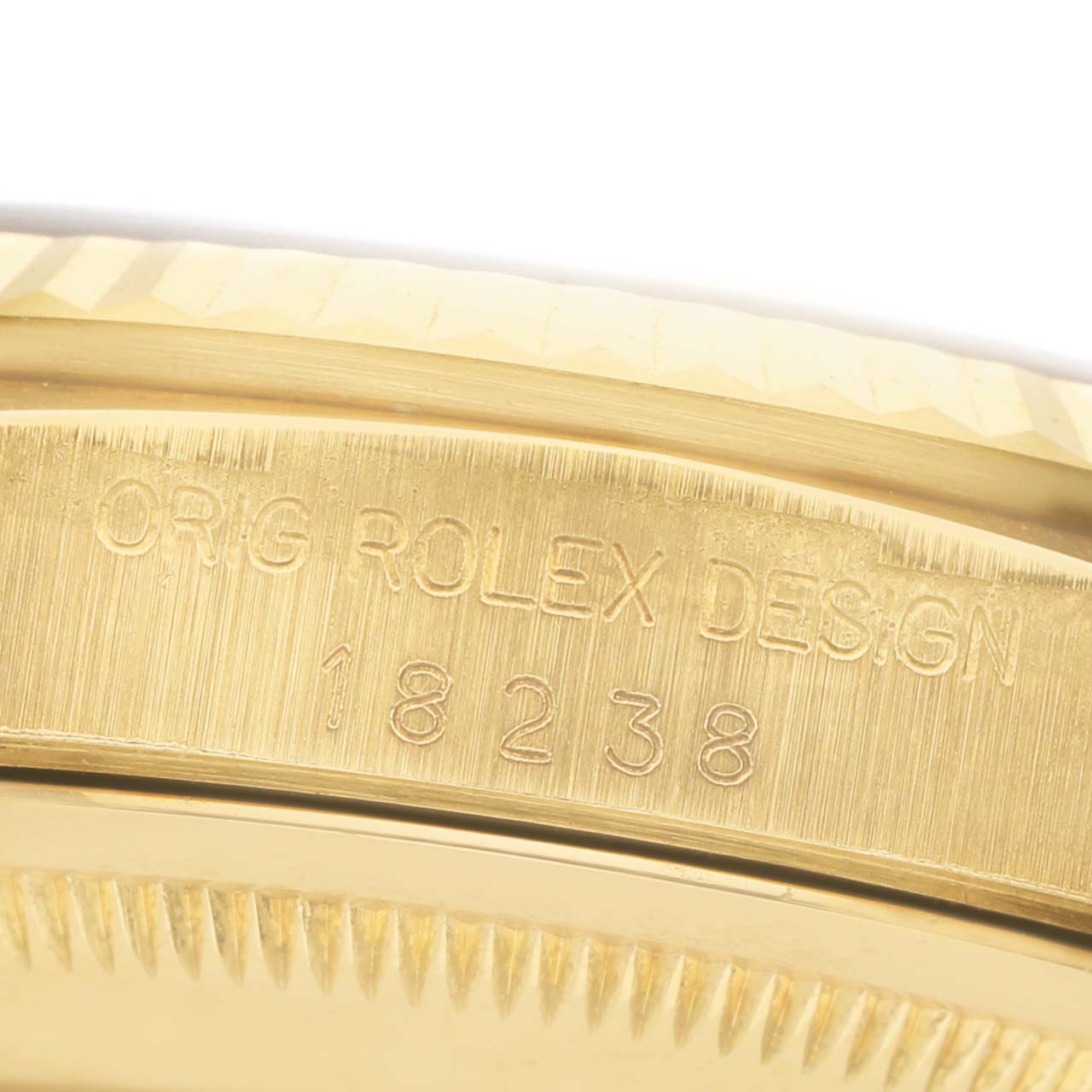 The image shows the side profile of a Rolex President 18238 Men's Yellow Gold Silver Dial model, highlighting the engraved model number "18238" on the watch case.
