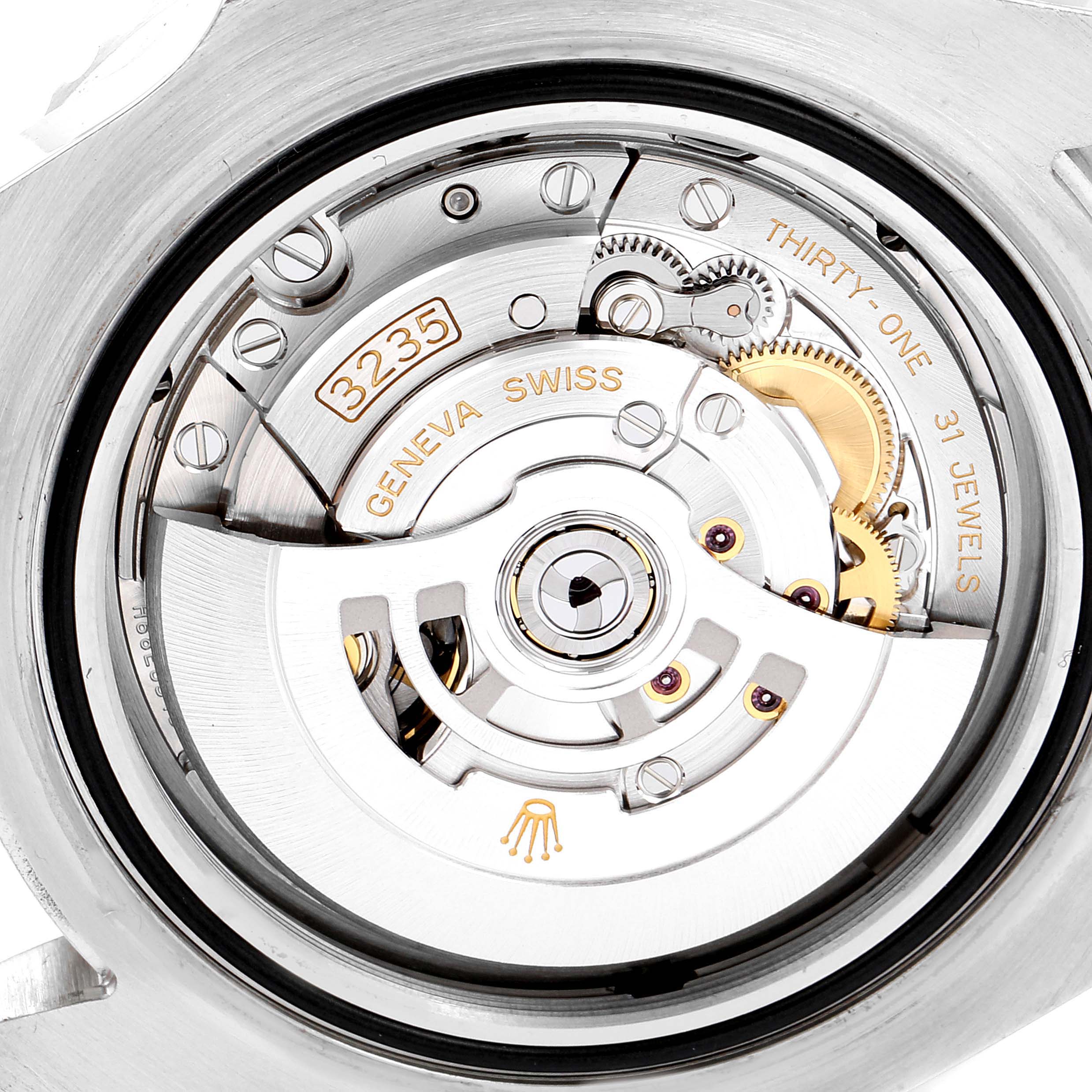 The image shows the back case and inner mechanism of the Rolex Sea-Dweller 126600 Men
s Stainless Steel Black Dial 126600 Men
s Stainless Steel Black Dial watch, highlighting the intricate components and engravings.