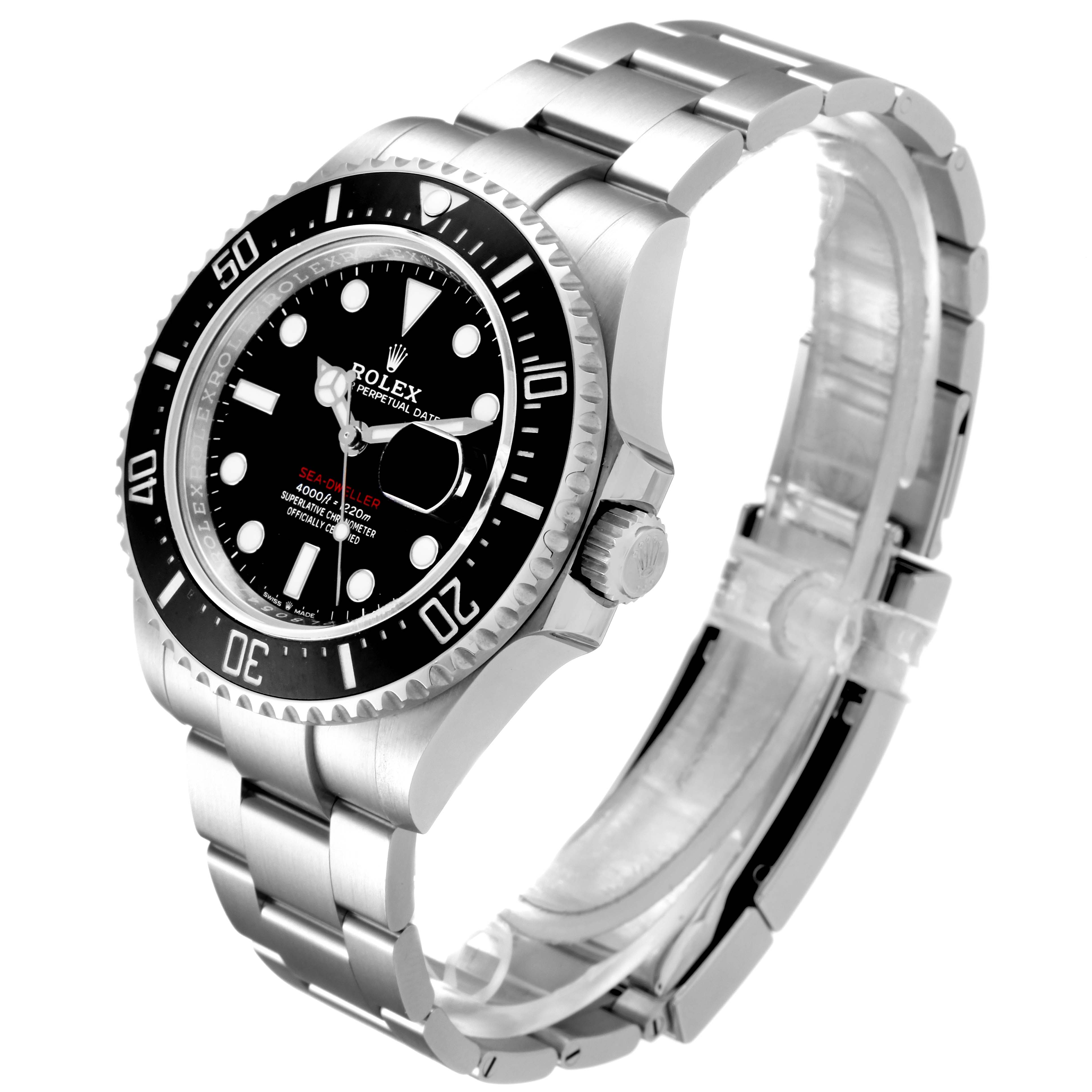 The image shows a Rolex Sea-Dweller 126600 Men
s Stainless Steel Black Dial 126600 Men
s Stainless Steel Black Dial watch at a three-quarter angle, highlighting the dial, bezel, case, and bracelet.