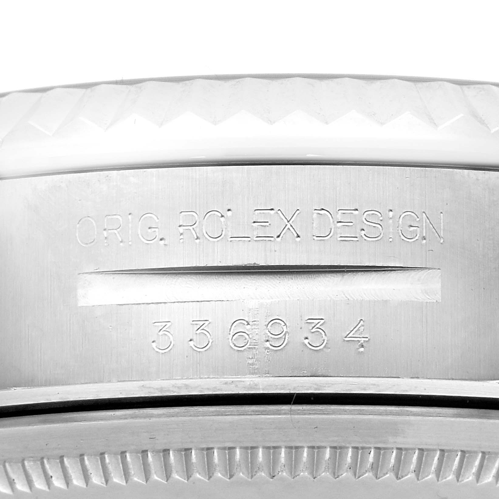 The image shows a close-up of the side case with engravings on the Rolex Sky-Dweller 336934 Men's Stainless Steel White Dial 336934 Men's Stainless Steel White Dial watch.
