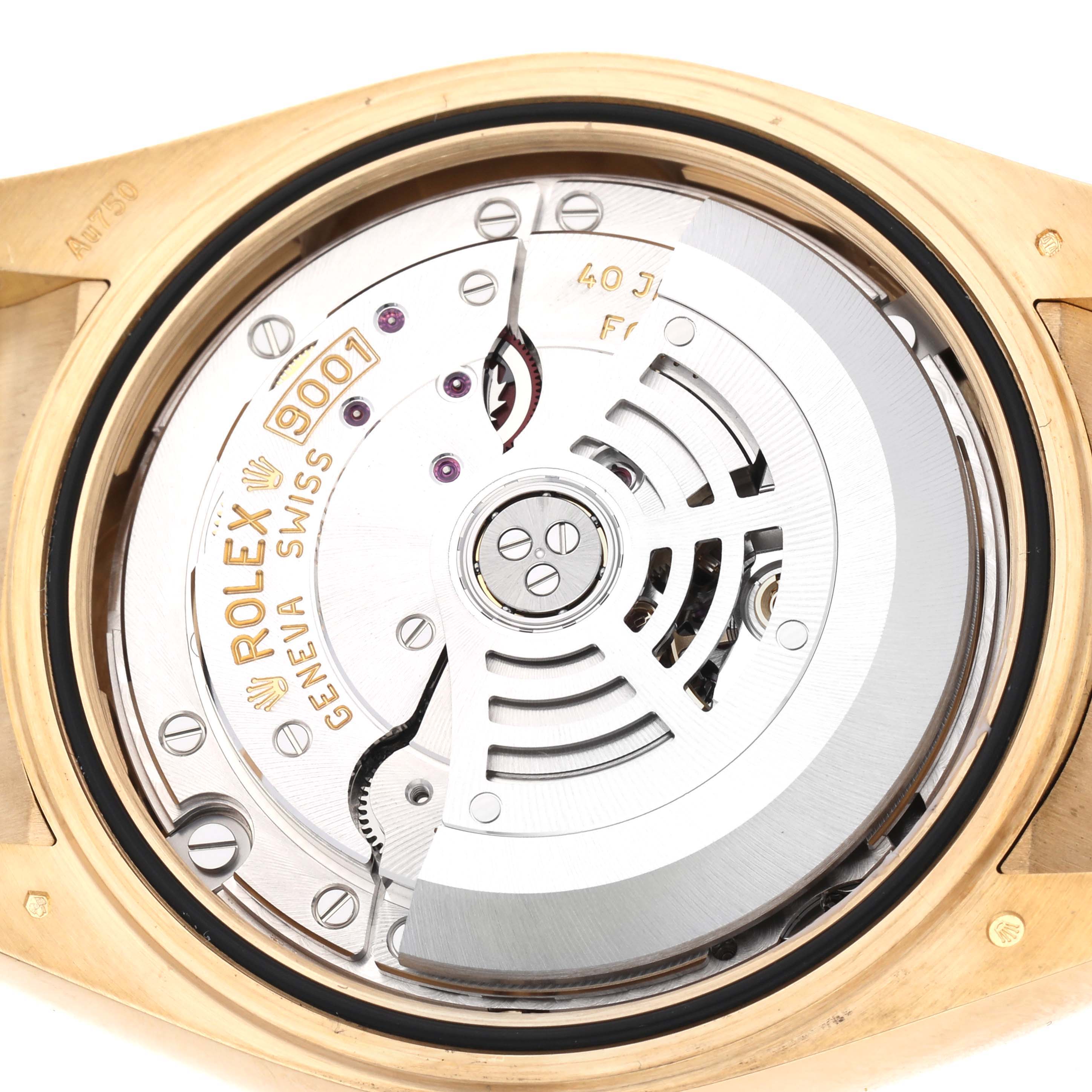 The image shows the movement of a Rolex Sky-Dweller 326238 Men's Yellow Gold White Dial 326238 Men's Yellow Gold White Dial watch from the back, highlighting the intricate mechanisms.