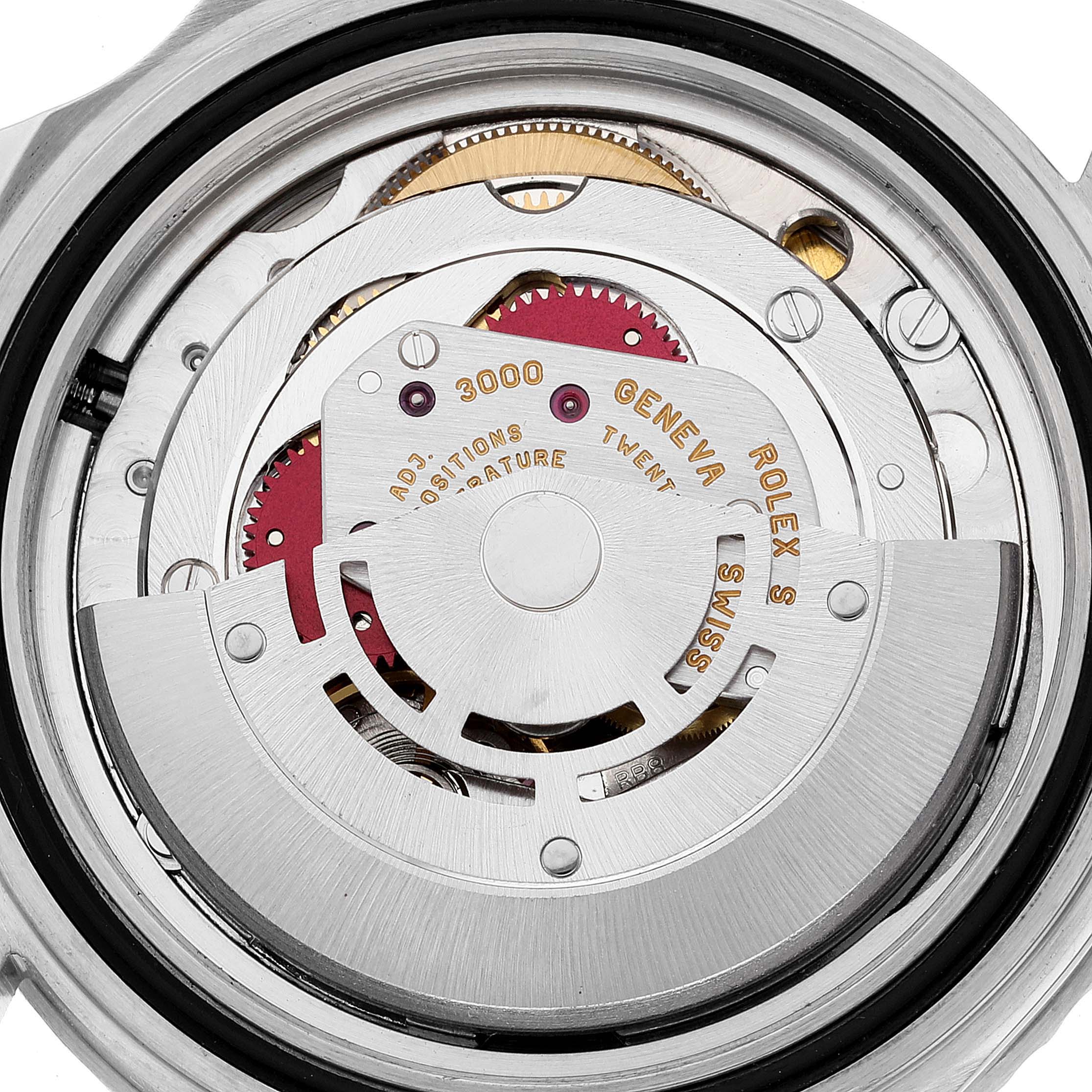 This image shows the movement mechanism of a Rolex Submariner 14060 Men
s Stainless Steel Black Dial 14060 Men
s Stainless Steel Black Dial watch from a back angle with the case removed.