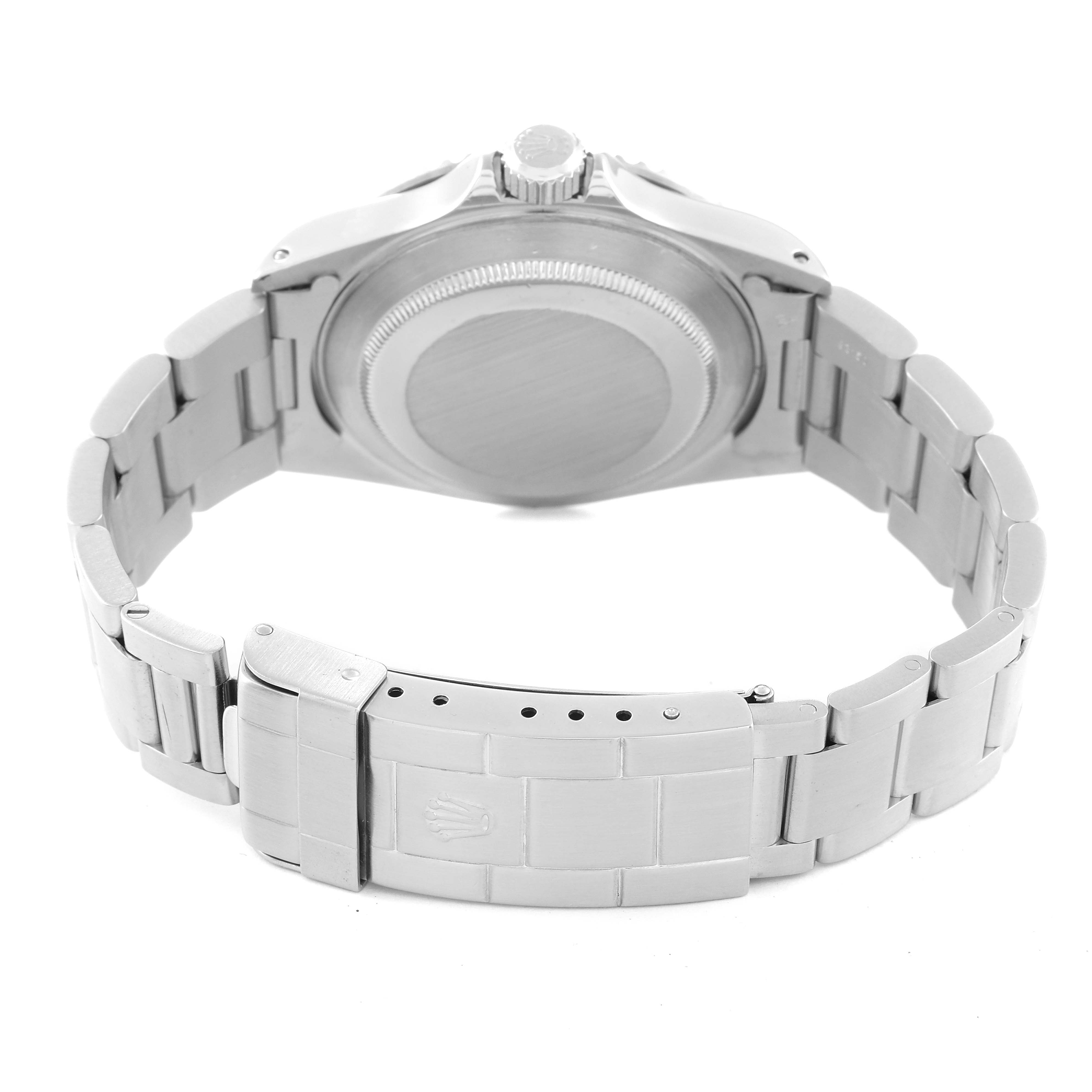 This image shows the back of the Rolex Submariner 14060 Men
s Stainless Steel Black Dial 14060 Men
s Stainless Steel Black Dial watch, highlighting the clasp, bracelet, and case back from a slightly tilted angle.