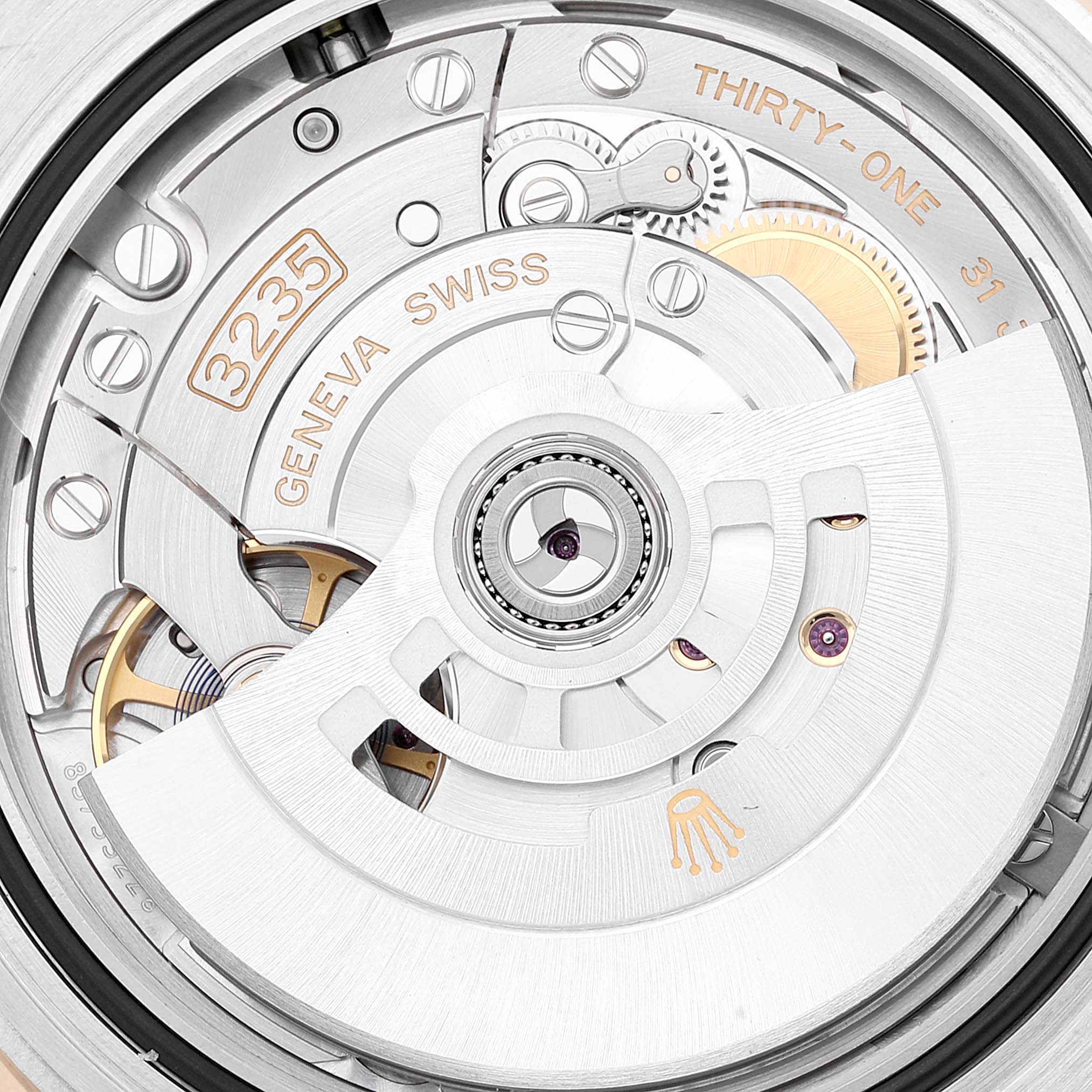 This image shows the movement mechanism of the Rolex Submariner 126613 Men's Steel and Gold (two tone) Blue Dial 126613 Men's Steel and Gold (two tone) Blue Dial watch, specifically the intricate details of the caliber 3235.