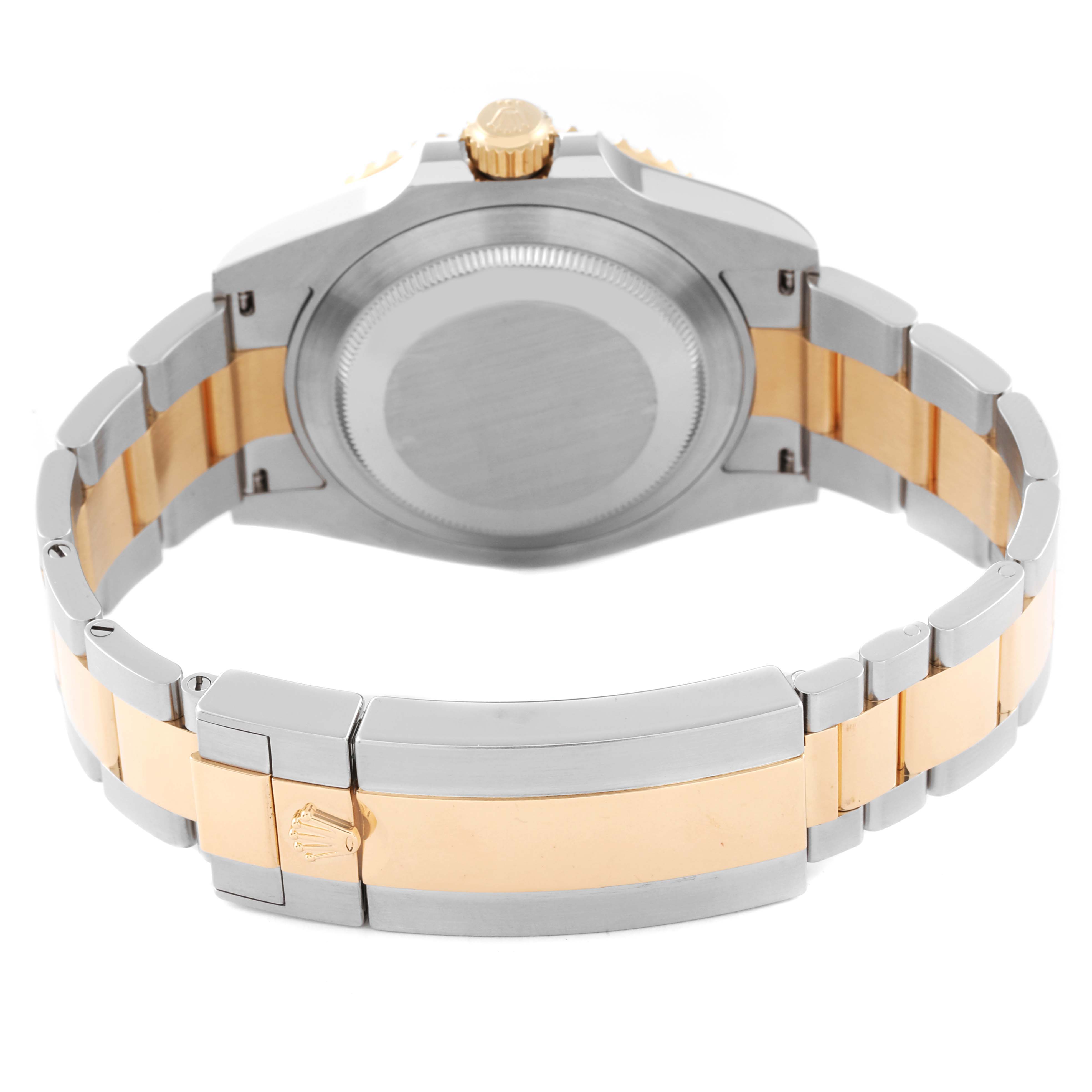 The image shows the back case and bracelet of a Rolex Submariner 126613 Men's Steel and Gold (two tone) Blue Dial 126613 Men's Steel and Gold (two tone) Blue Dial, highlighting its two-tone metal design.