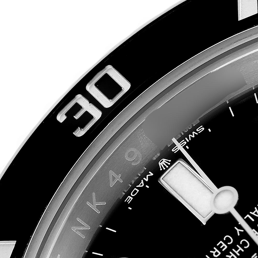The image shows a close-up of the Rolex Submariner 126610 Men's Stainless Steel Black Dial 126610 Men's Stainless Steel Black Dial's bezel, dial, and part of the hand at an angle highlighting the "30" marking.