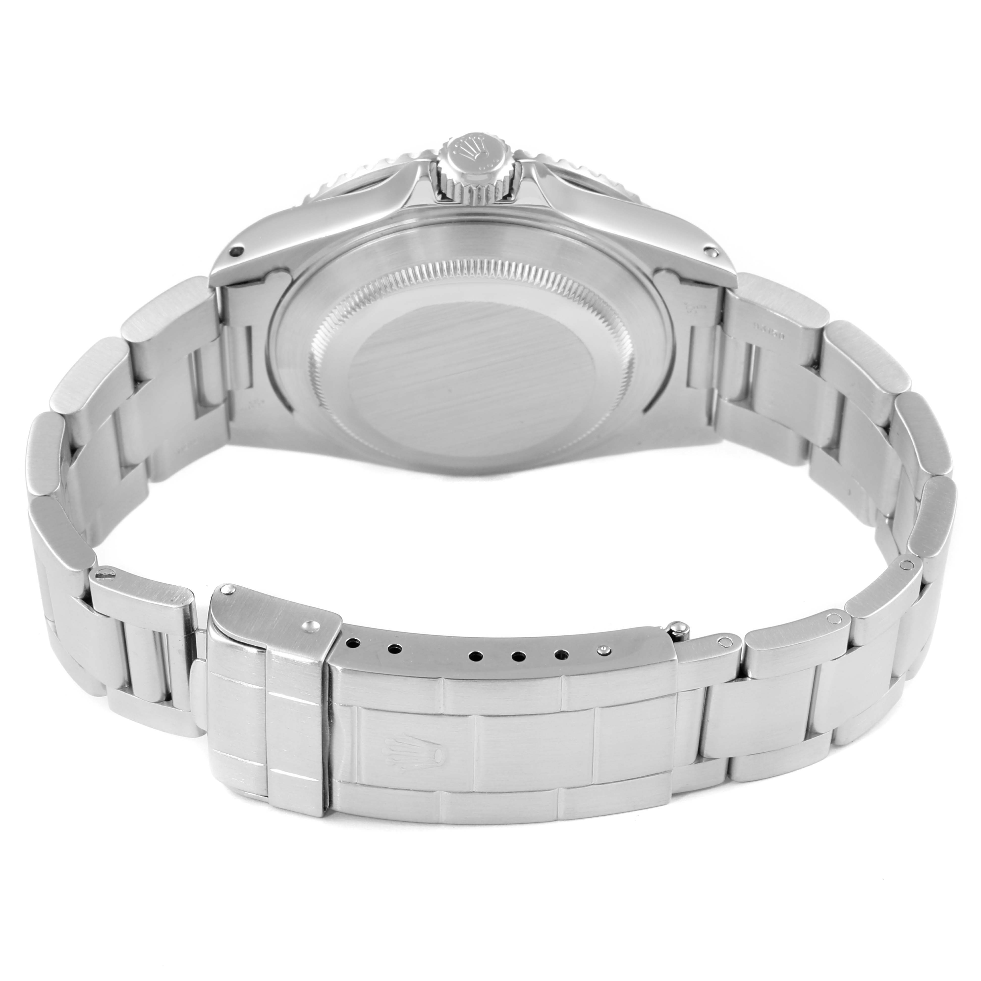 The image shows the back view of a Rolex Submariner 16610 Men
s Stainless Steel Black Dial 16610 Men
s Stainless Steel Black Dial watch, including the case back, bracelet, and clasp.