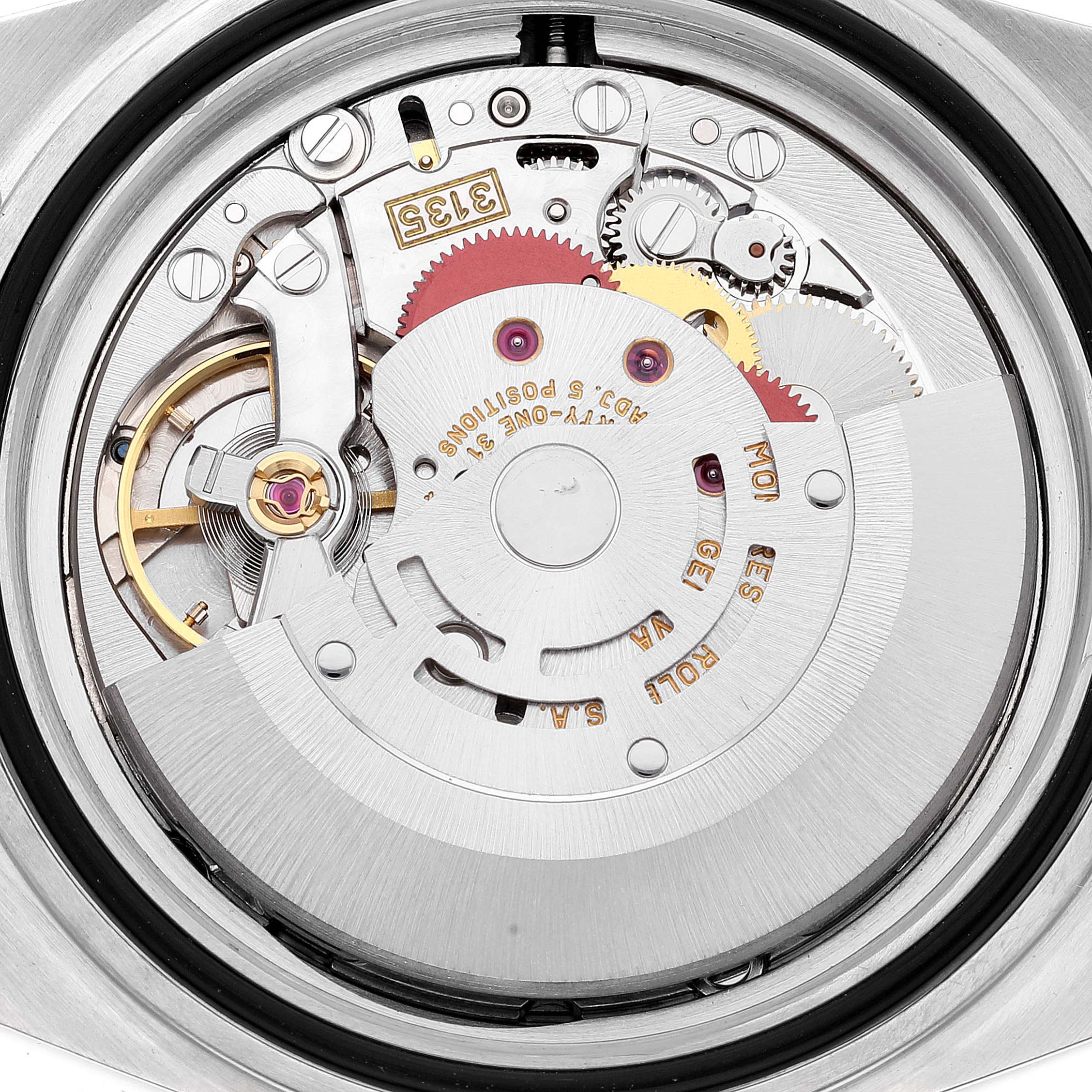 This image shows the internal mechanical movement of the Rolex Submariner 16613 Men's Steel and Gold (two tone) Blue Dial 16613 Men's Steel and Gold (two tone) Blue Dial watch from a close-up angle.