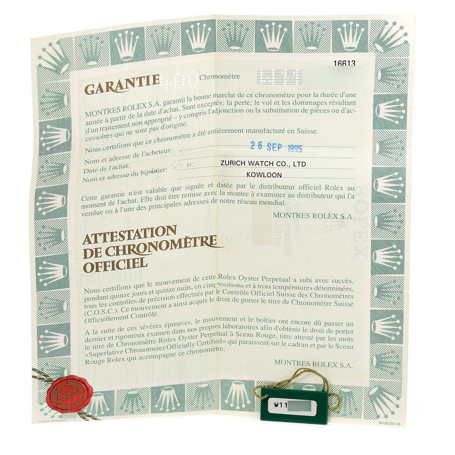 This image shows the warranty and certification paperwork for a Rolex Submariner 16613 Men's Steel and Gold (two tone) Blue Dial 16613 Men's Steel and Gold (two tone) Blue Dial watch.