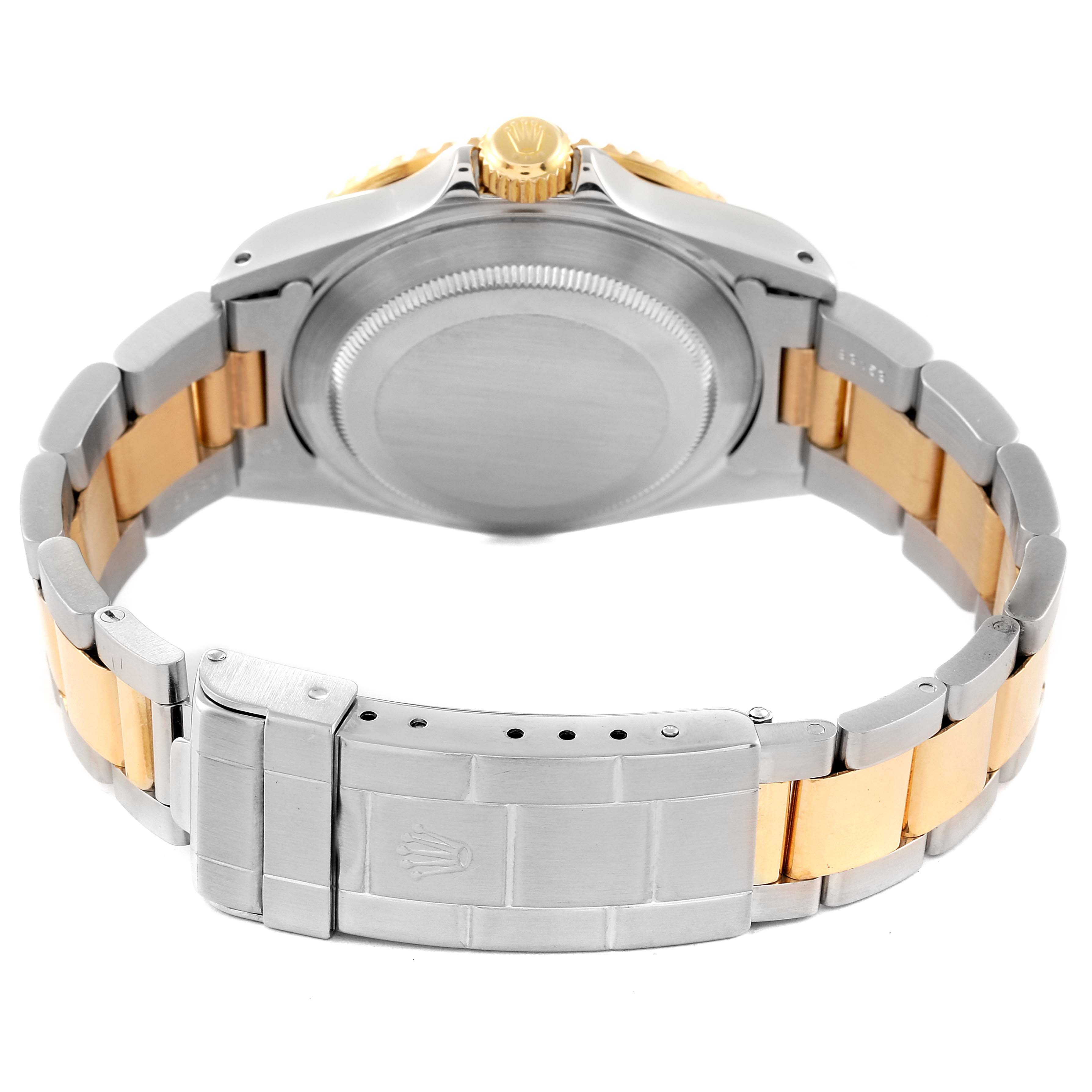 This image shows the back case and bracelet clasp of a Rolex Submariner 16613 Men's Steel and Gold (two tone) Blue Dial 16613 Men's Steel and Gold (two tone) Blue Dial watch.