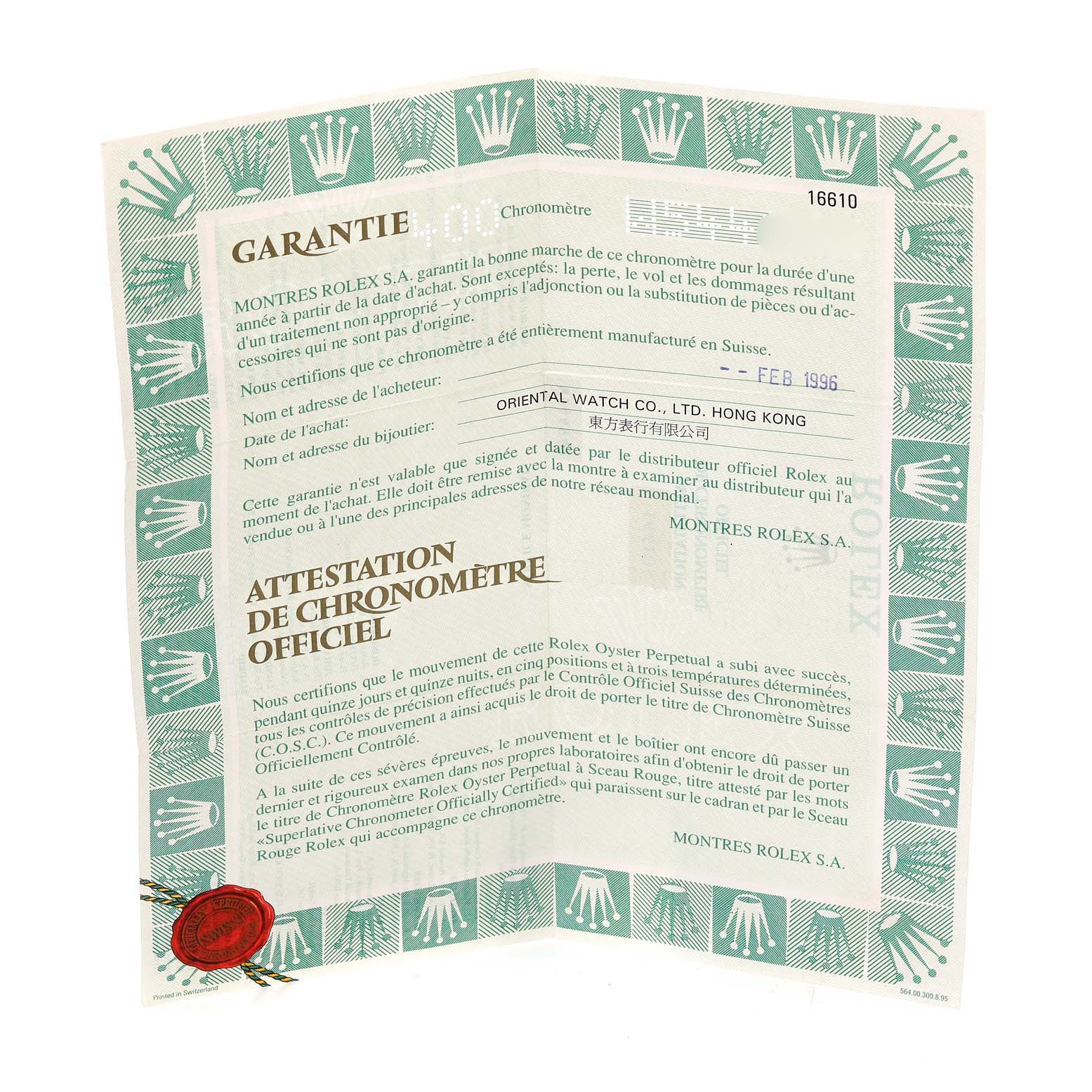 This is a warranty certificate for a Rolex Submariner 16610 Men
s Stainless Steel Black Dial 16610 Men
s Stainless Steel Black Dial, viewed fully open and showing text in French.