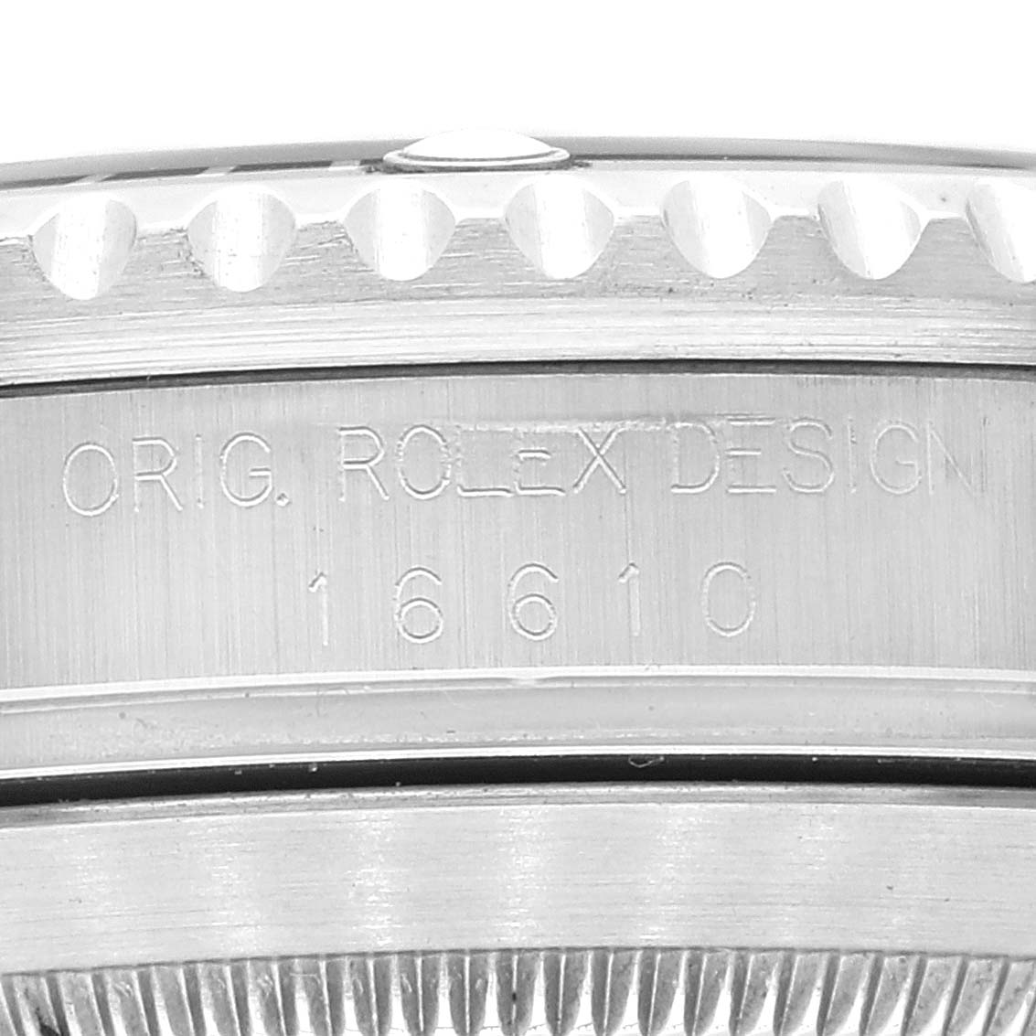 This close-up image shows the side view of the Rolex Submariner 16610 Men
s Stainless Steel Black Dial 16610 Men
s Stainless Steel Black Dial model, focusing on the serial number and part of the bezel.