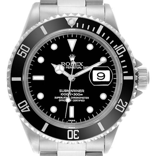 The Rolex Submariner watch is shown from a front angle, displaying the dial, bezel, and part of the bracelet.