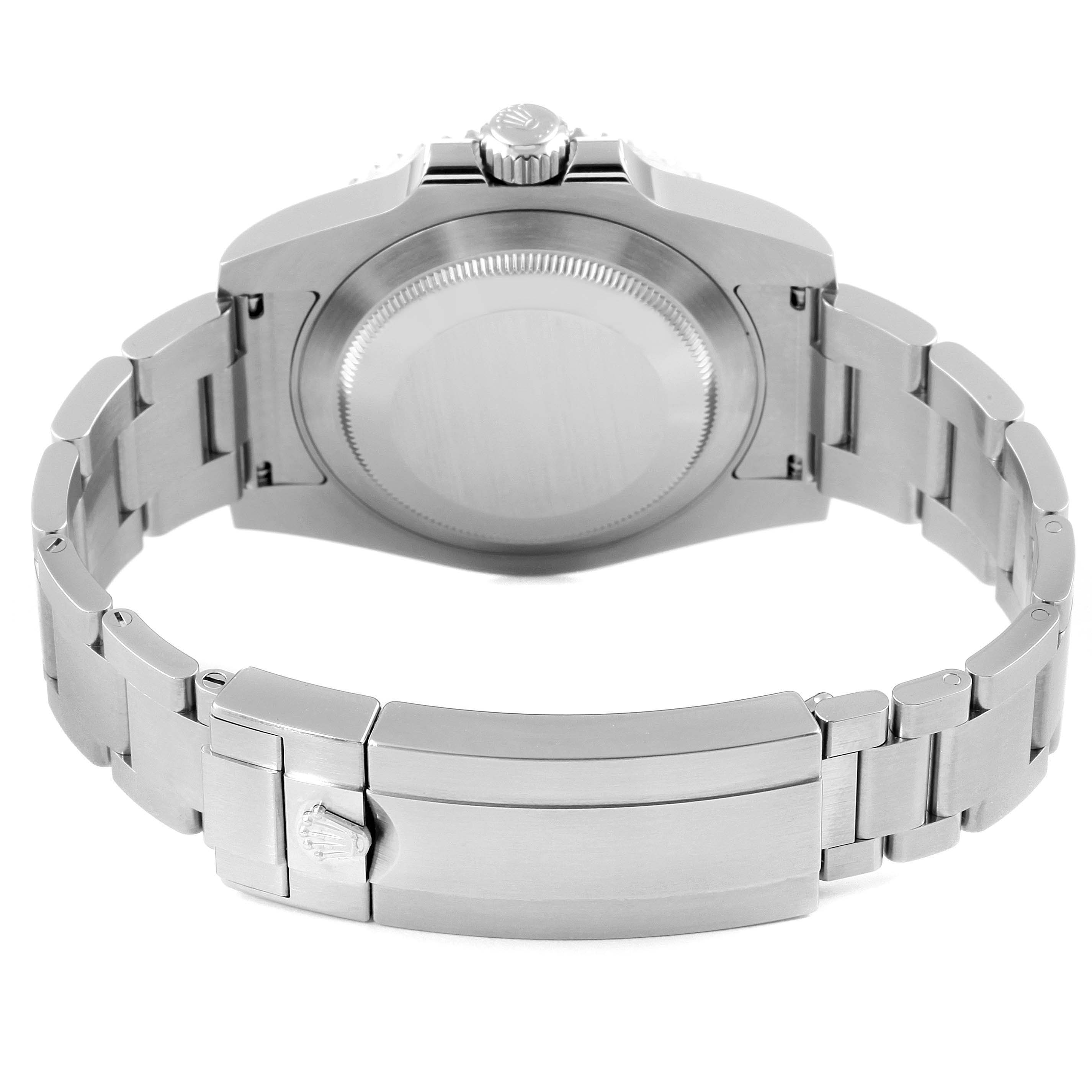 This image shows the backside of the Rolex Submariner 116610LV Men
s Stainless Steel Green Dial 116610LV Men
s Stainless Steel Green Dial watch, highlighting the case back, bracelet, and clasp.