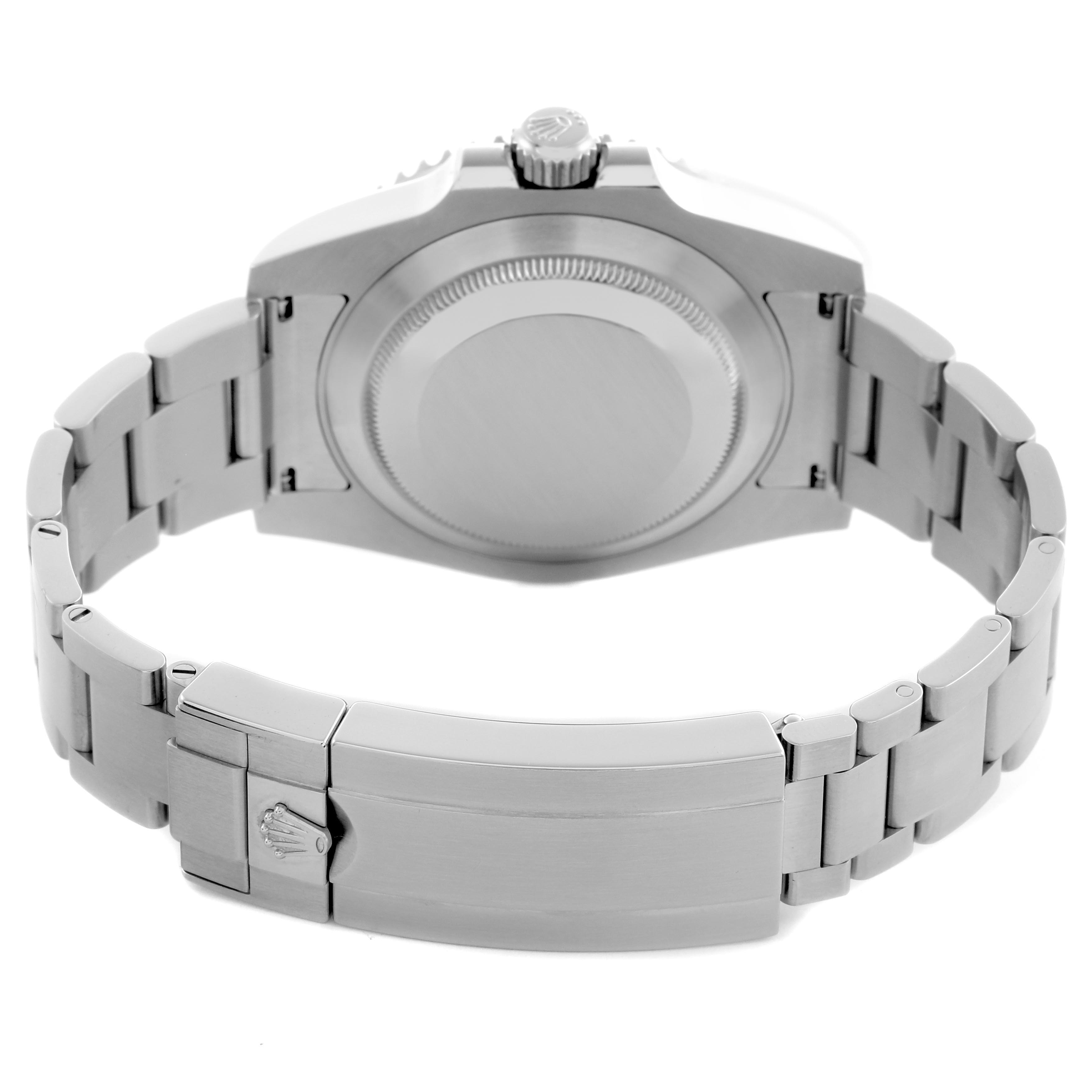 The image shows the back of a Rolex Submariner 116610LV Men's Stainless Steel Green Dial 116610LV Men's Stainless Steel Green Dial watch, focusing on the case back and bracelet clasp.